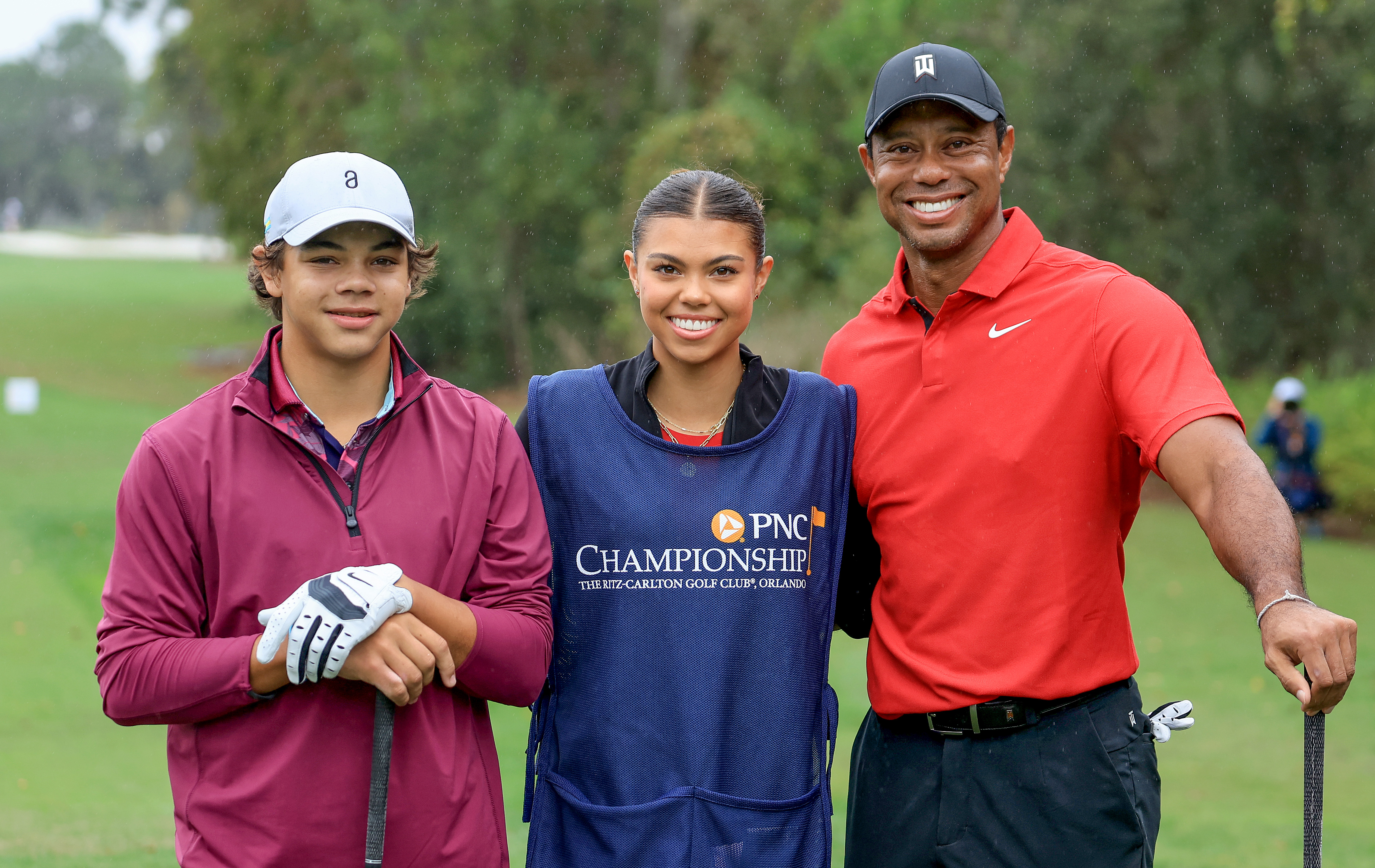 Tiger Woods with his son, Charlie, and daughter, Sam, during the PNC Championship final round in Orlando, Florida, on December 17, 2023 | Source: Getty Images