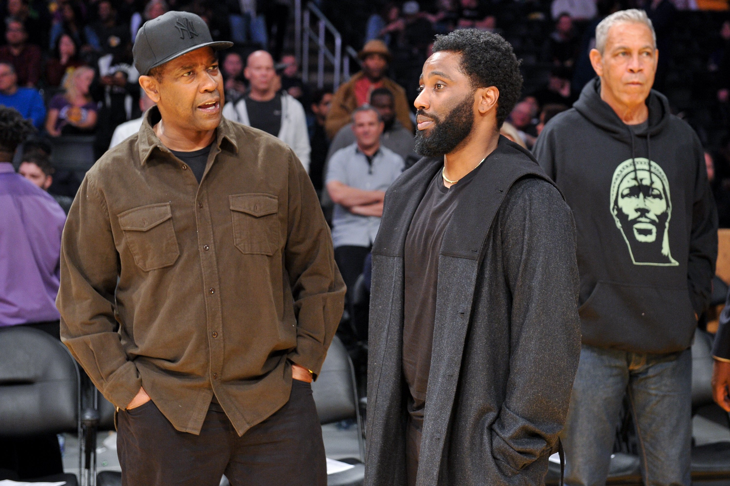 Denzel Washington and his son John David Washington attend a basketball game between the Los Angeles Lakers and the San Antonio Spurs at Staples Center on December 05, 2018, in Los Angeles, California. | Source: Getty Images 