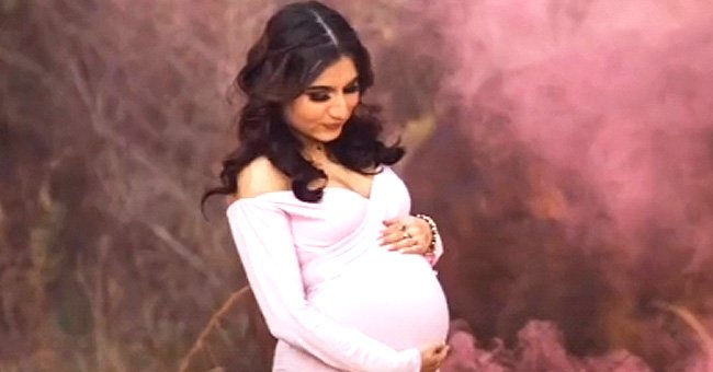 In a viral TikTok video, a pregnant mother cradles her belly | Photo: Tiktok/vanessaguilars