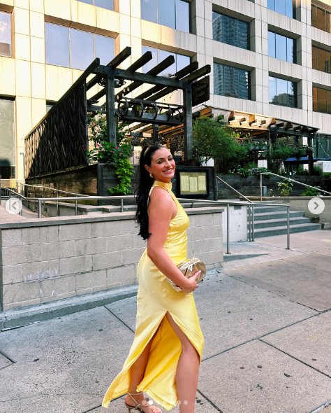 A guest posing for a photo during Victoria Schultz and Jon Runyan Jr.'s wedding weekend celebration, July 15, 2024 | Source: Instagram/isabellamoranda