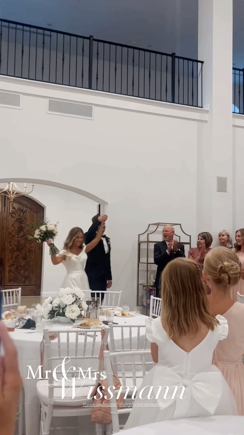 Jana Duggar and Stephen Wissmann enter their reception hall with guests and family, as shared in an Instagram Story in August 2024 | Source: Instagram/alaythia.wissmann