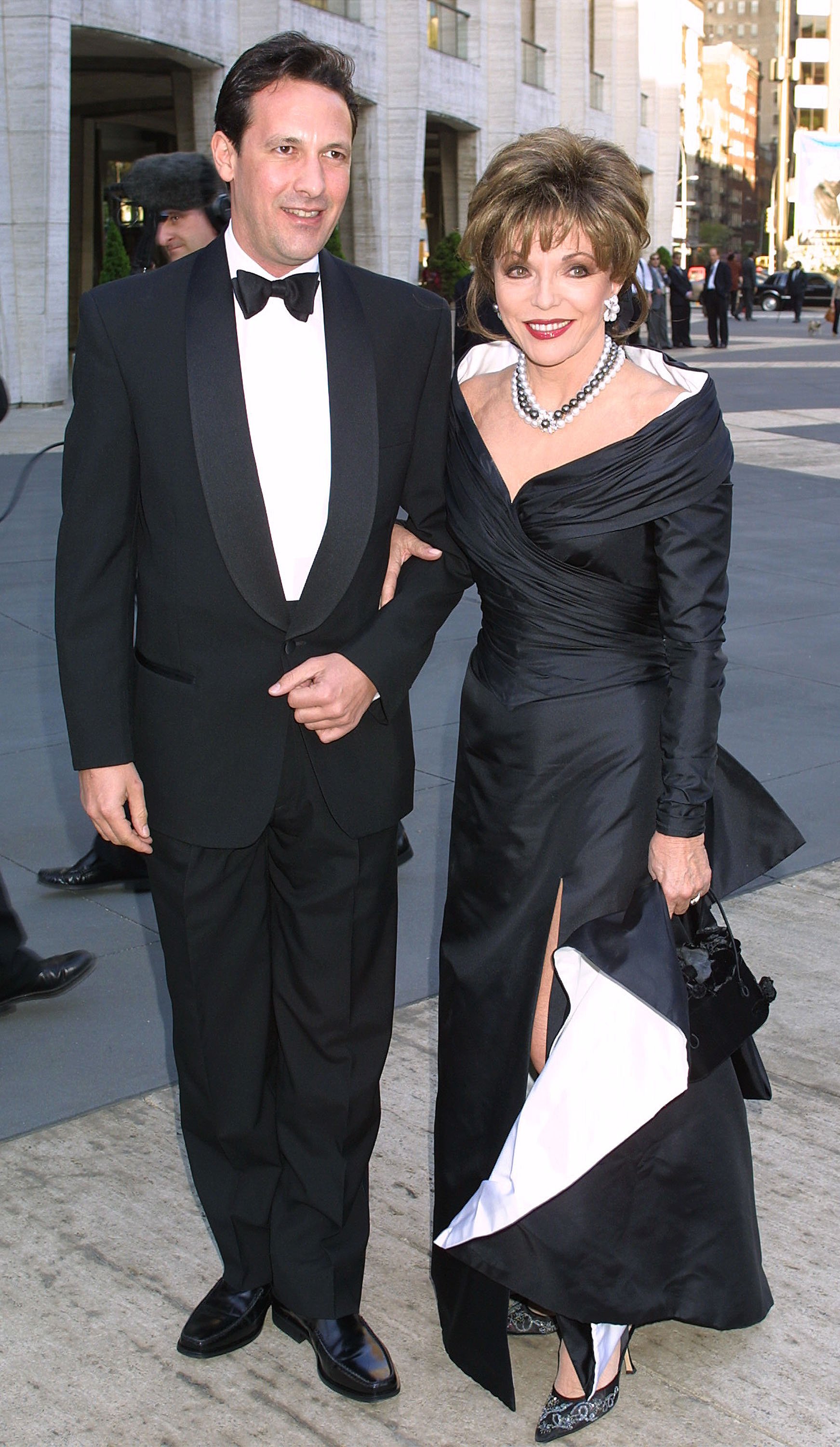 Joan Collins and Percy Gibson attend the American Ballet Theater's Spring 2001 Gala April 30, 2001 at The Metropolitan Opera House in Lincoln Center in New York City | Source: Getty Images 