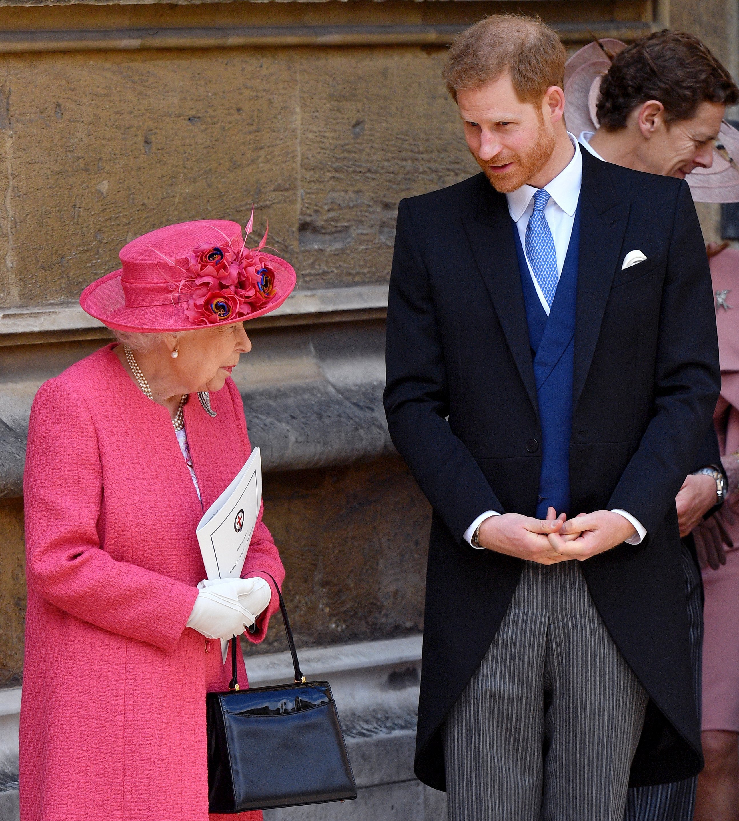  Queen Elizabeth II and Prince Harry otuside St George's Chapel in Windsor Castle, England | Photo: Getty Images