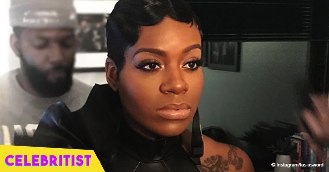 Fantasia flaunts deep cleavage in black outfit in video singing with Anita Baker & Stephanie Mills