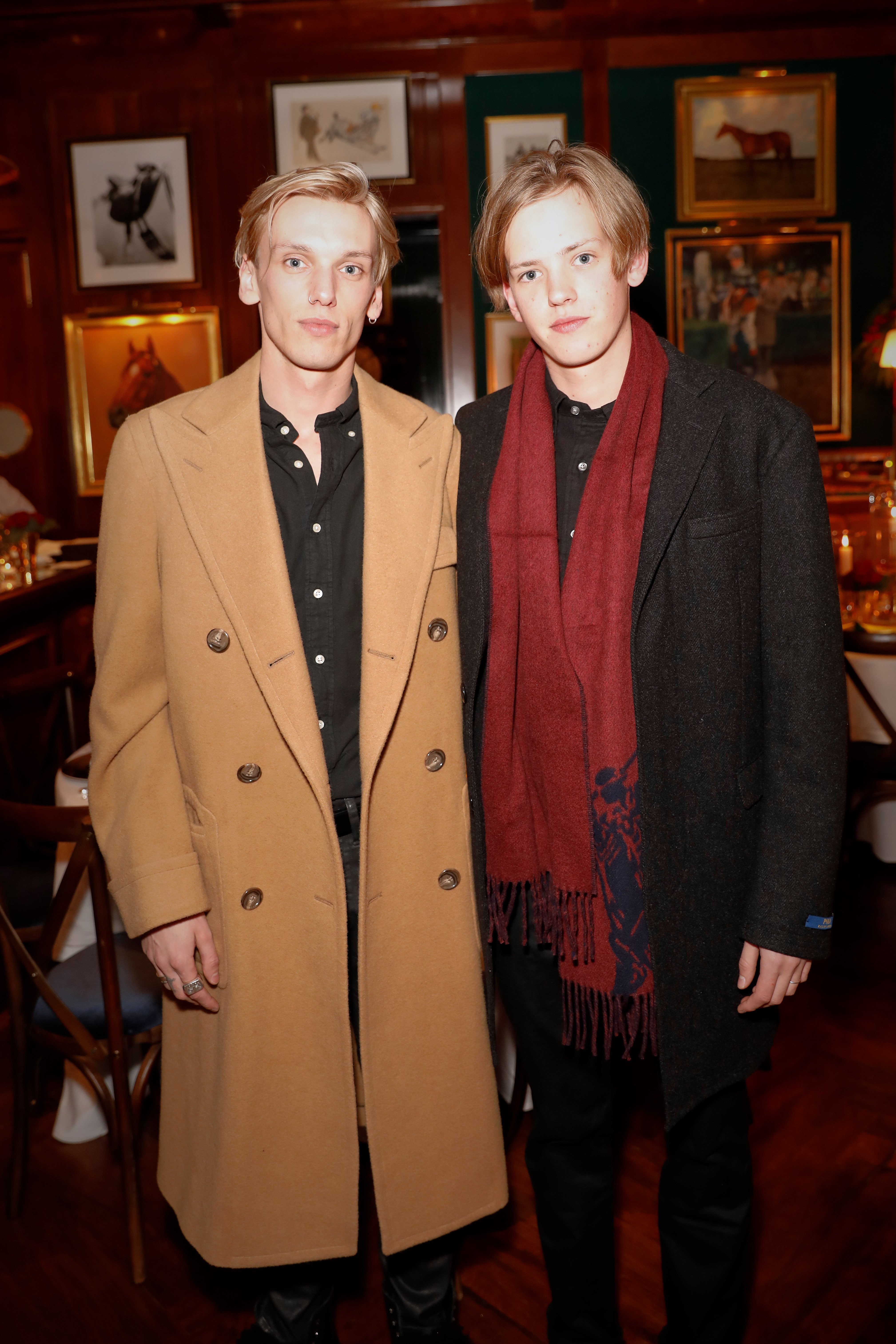 Jamie Campbell Bower and Sam Bower attend the Polo Bear Holiday Dinner on December 5, 2017, in London, England | Source: Getty Images