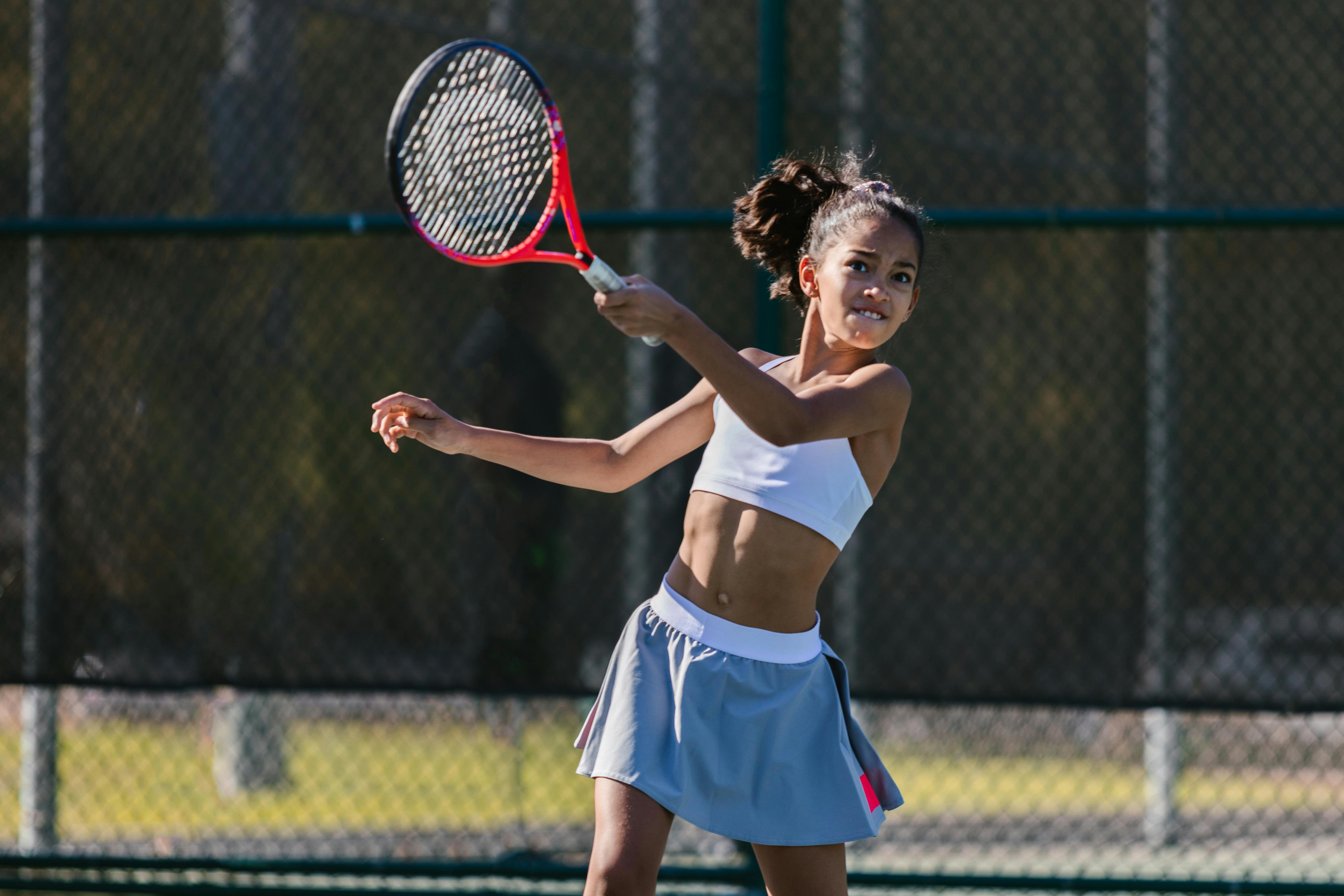 A girl playing tennis | Source: Pexels
