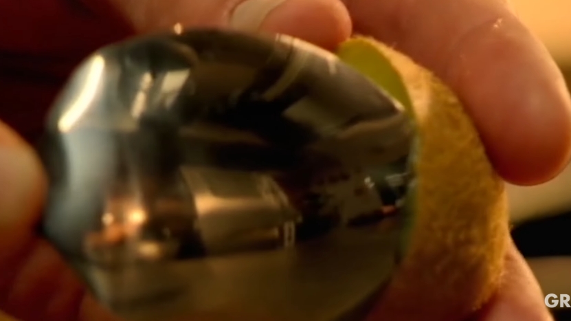 Using nothing more than a teaspoon, Gordon Ramsay scoops the flesh from a halved kiwi, demonstrating a quick and tidy alternative to peeling it with a knife. The technique helps separate the fruit cleanly from the skin while minimizing waste. | Source: YouTube/ Gordon Ramsay