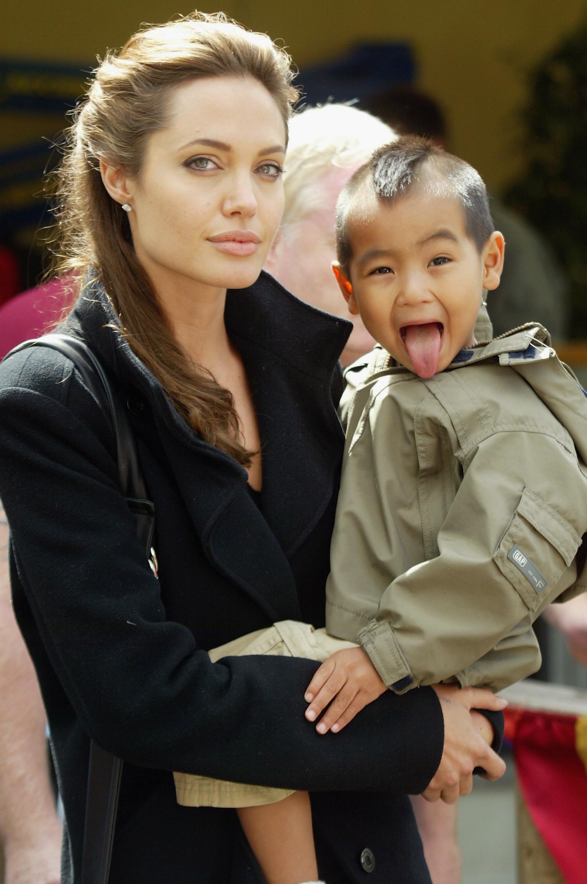 Angelina Jolie and her son Maddox at Live 8, Africa Calling on July 2, 2005 in St. Austell, Cornwall, England.  |  Source: Getty Images