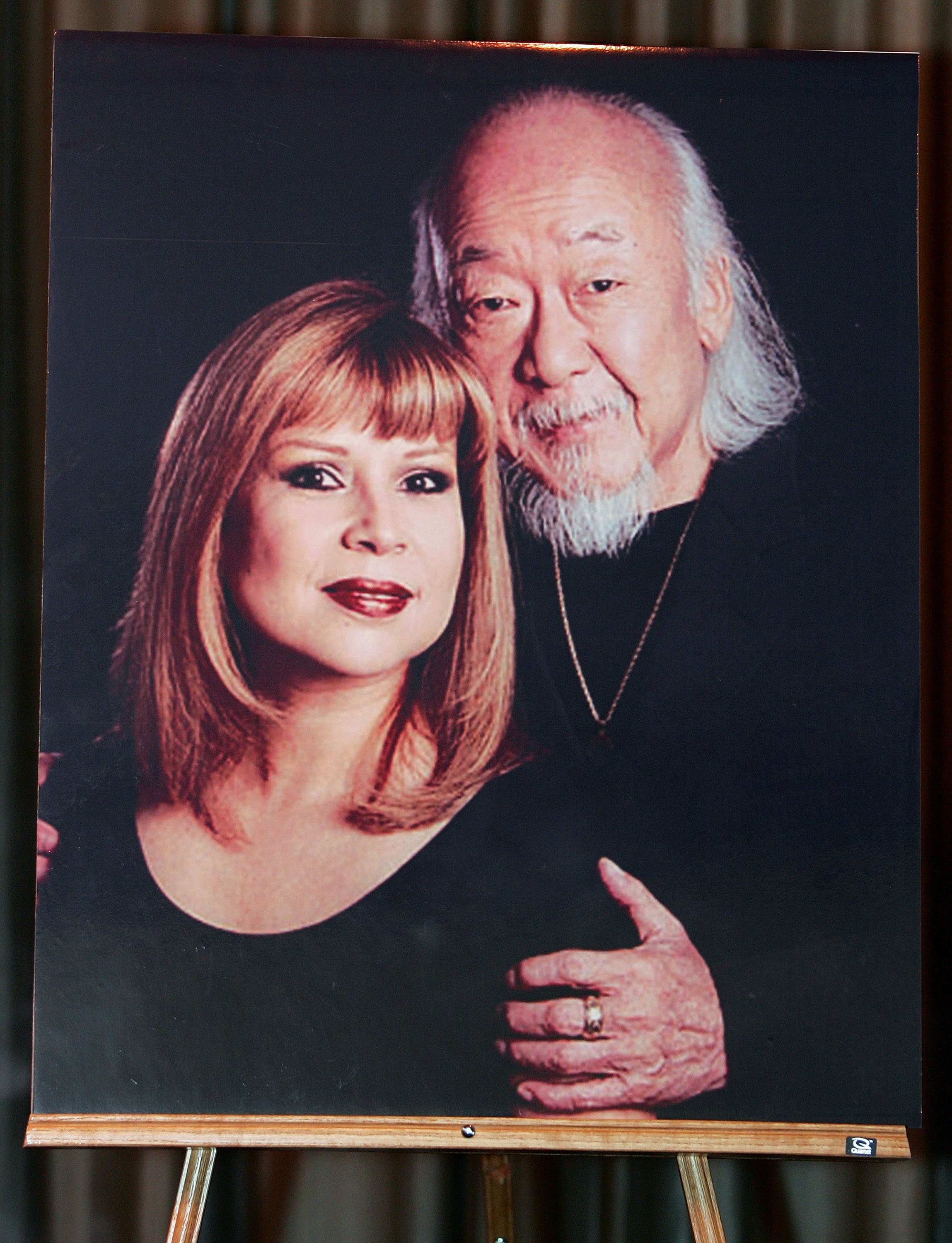 A photo of Pat Morita and his wife, Evelyn Guerrero, displayed during a memorial service for him at the Palm Mortuary & Memorial Park November 30, 2005 in Las Vegas, Nevada. | Source: Getty Images