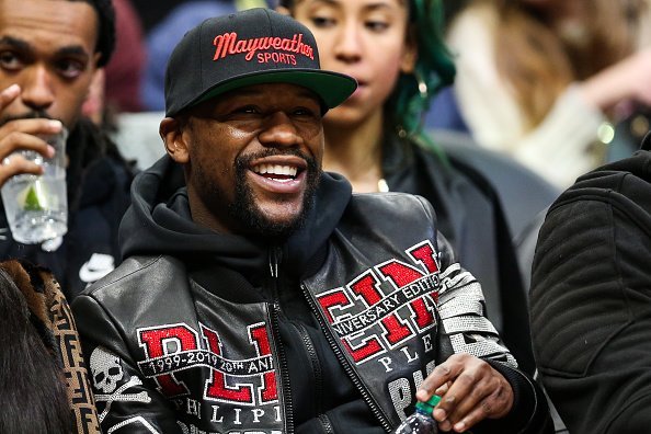 Floyd Mayweather watches a game between the Atlanta Hawks and the Milwaukee Bucks at State Farm Arena in Atlanta, Georgia on December 27, 2019. | Photo: Getty Images