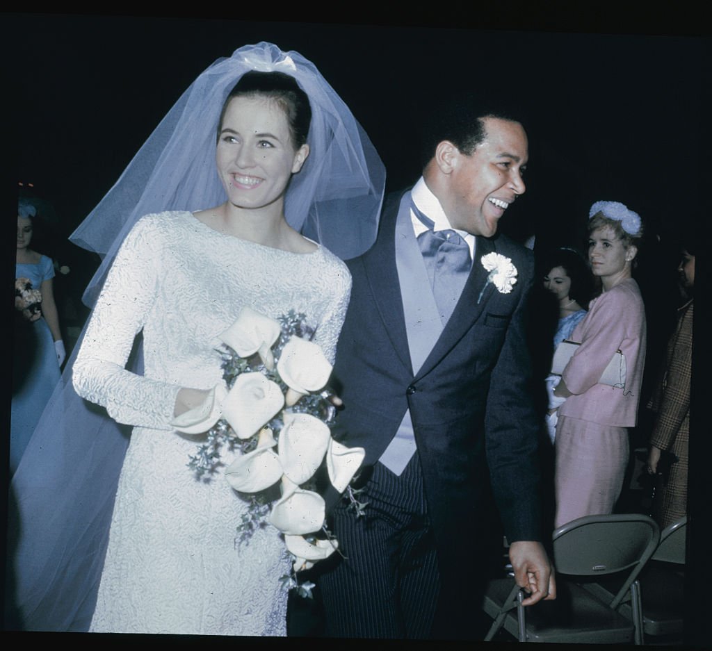 Chubby Checker and His new bride, Catharina Lodders, following their wedding at temple Lutheran Church on April 12, 1964. | Photo: Getty Images