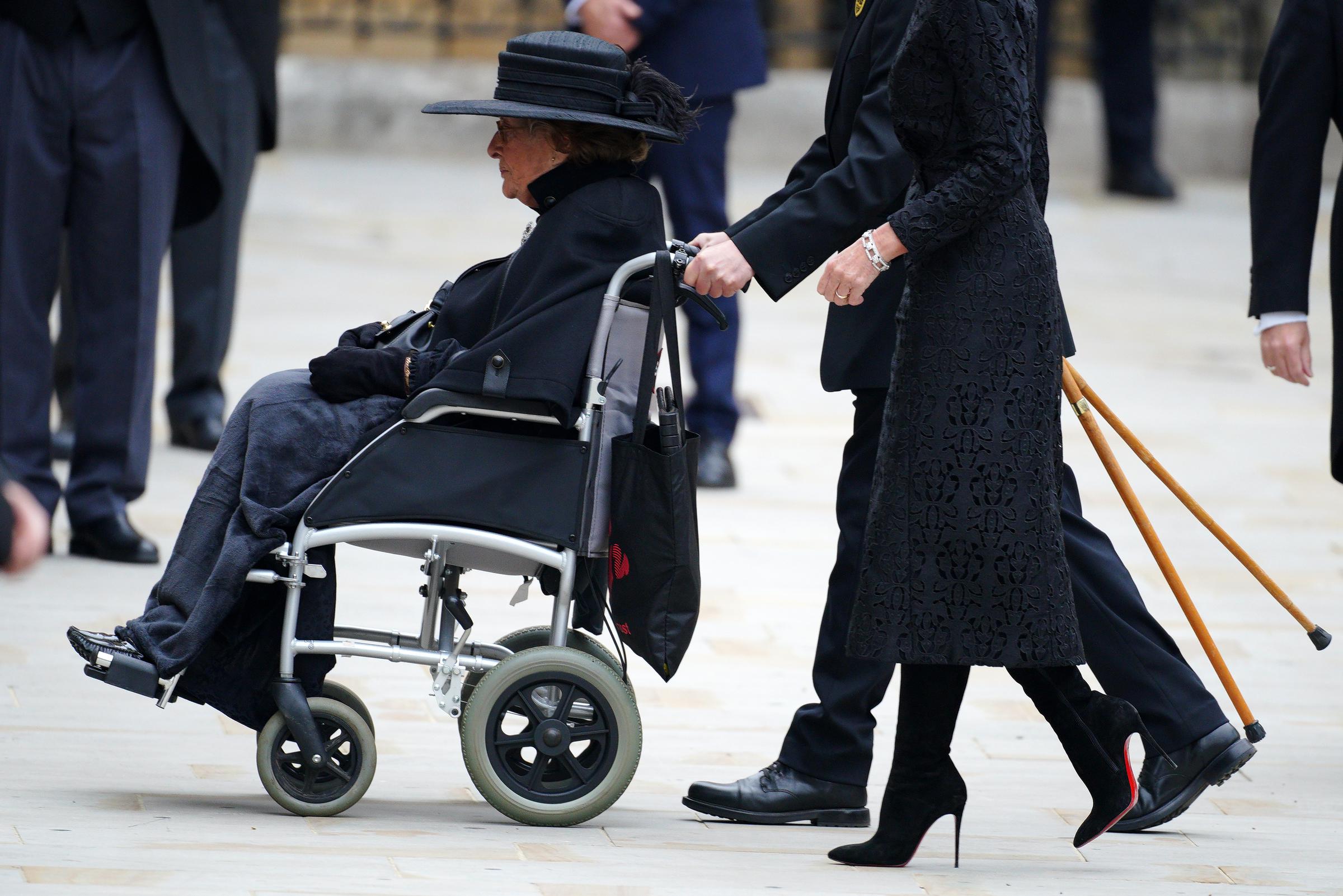 Taken on 19 September 2022 at Westminster Abbey in London, Lady Pamela Hicks arrives to attend the State Funeral of Queen Elizabeth II, dressed in black with a wide-brimmed hat, reflecting the solemnity of the historic occasion alongside fellow mourners gathered in tribute.