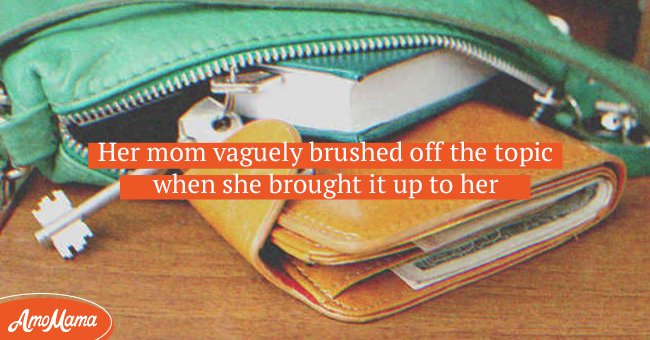 OP saw an old picture of her mom with an unknown newborn baby sticking out of her mom's wallet | Source: Shutterstock 