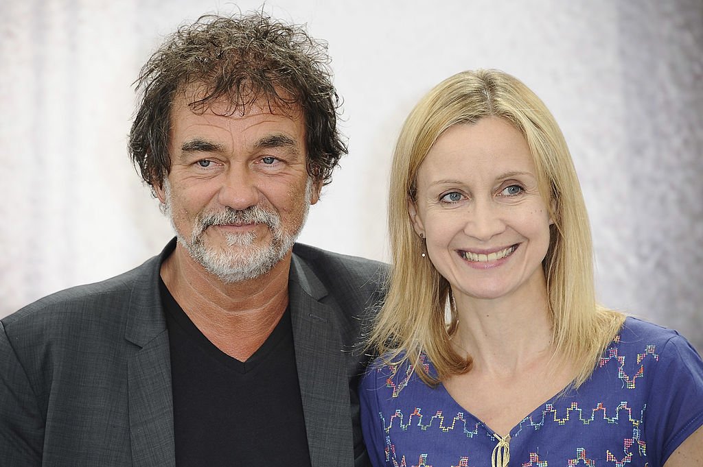 Le comédien Olivier Marchal aux côtés de sa femme en 2013. l Source : Getty Images Le comédien Olivier Marchal aux côtés de sa femme en 2013. l Source : Getty Images