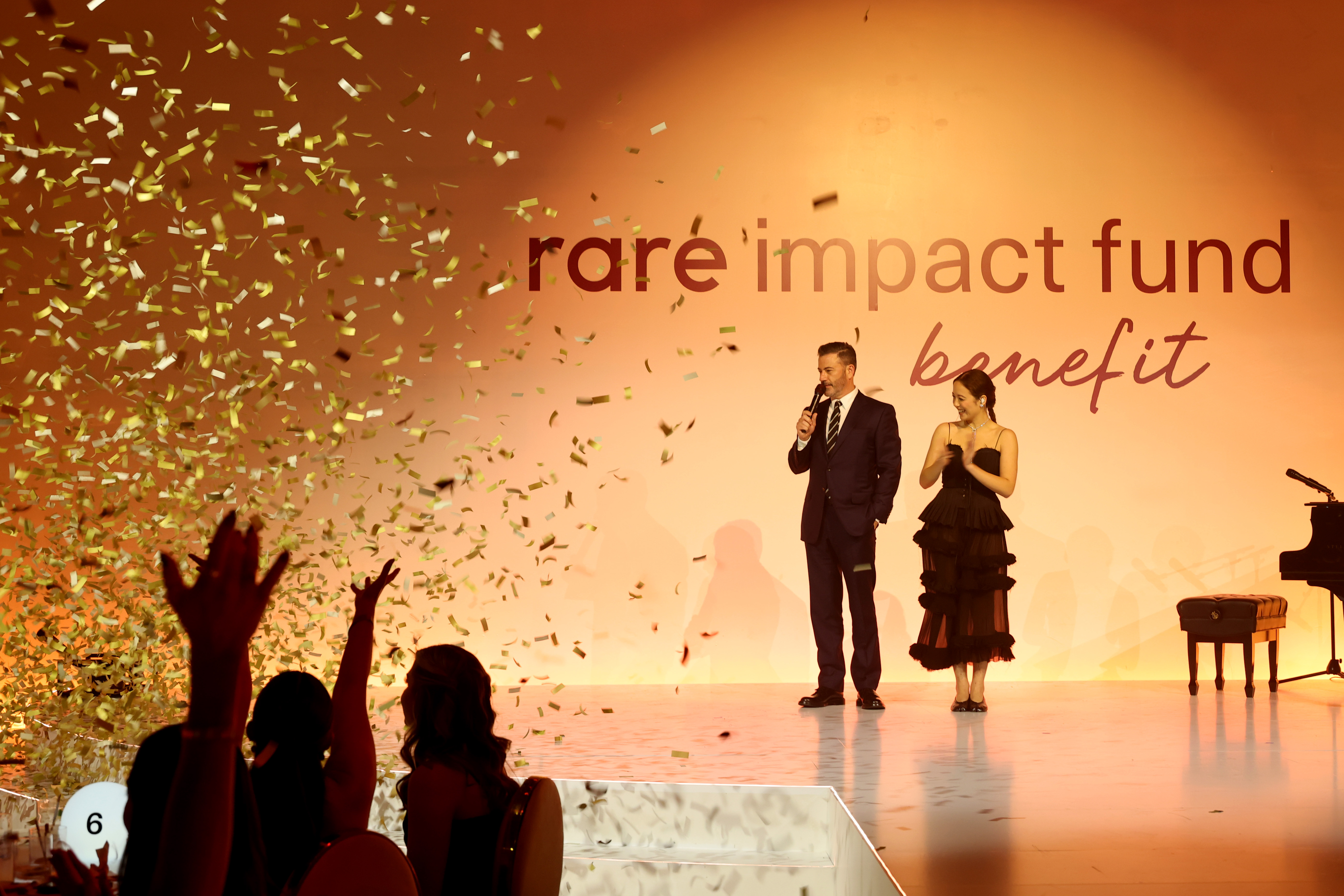 Jimmy Kimmel and Laufey speak onstage during the Rare Impact Fund Benefit held at Nya Studios in California on October 29, 2025. | Source: Getty Images