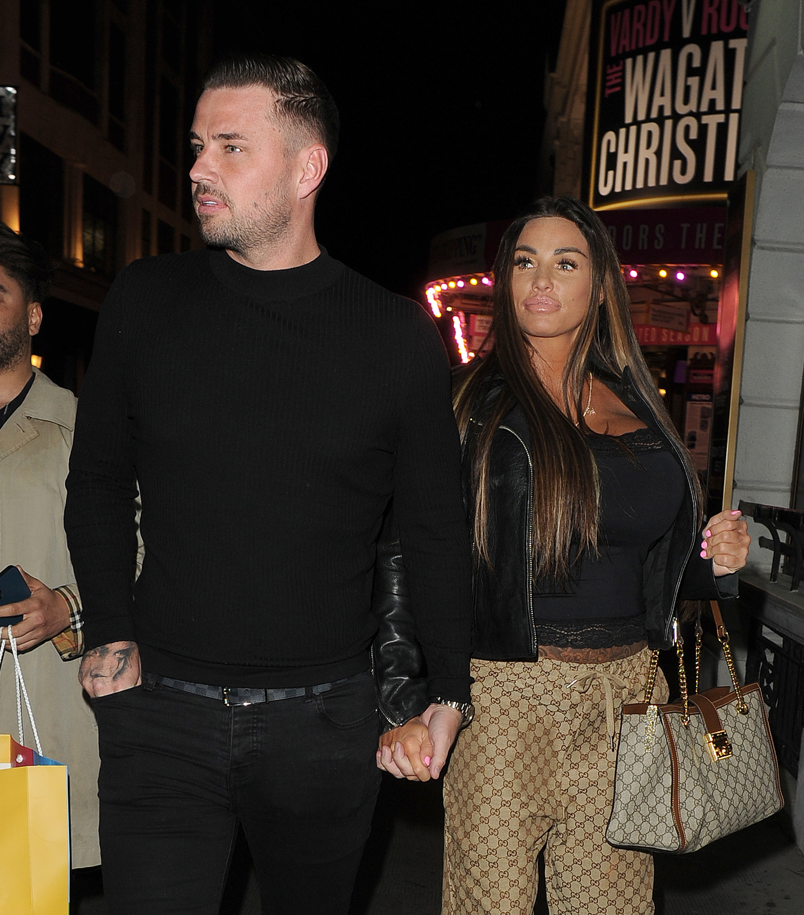 Carl Woods and Katie Price seen leaving the Ambassadors theatre on April 13, 2023, in London, England. | Source: Getty Images