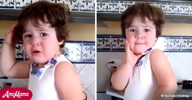 Angry little girl strikes a pose when she notices camera (video)
