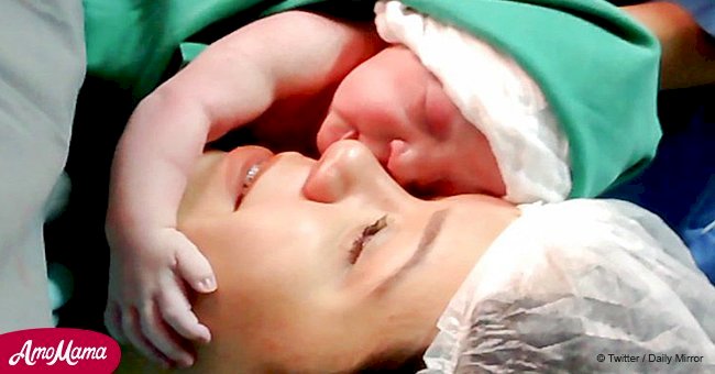 Breathtaking moment baby hugs her mother seconds after being born