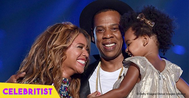 Beyoncé dazzles in flowing red maxi dress with Jay Z & Blue Ivy in France amid pregnancy rumors