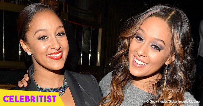 Tia and Tamera Mowry look radiant posing with their curly, little sons for family photo