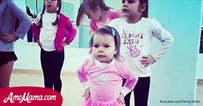 Girls were ready to start dance class. But when the music began, a little one had her own rhythm