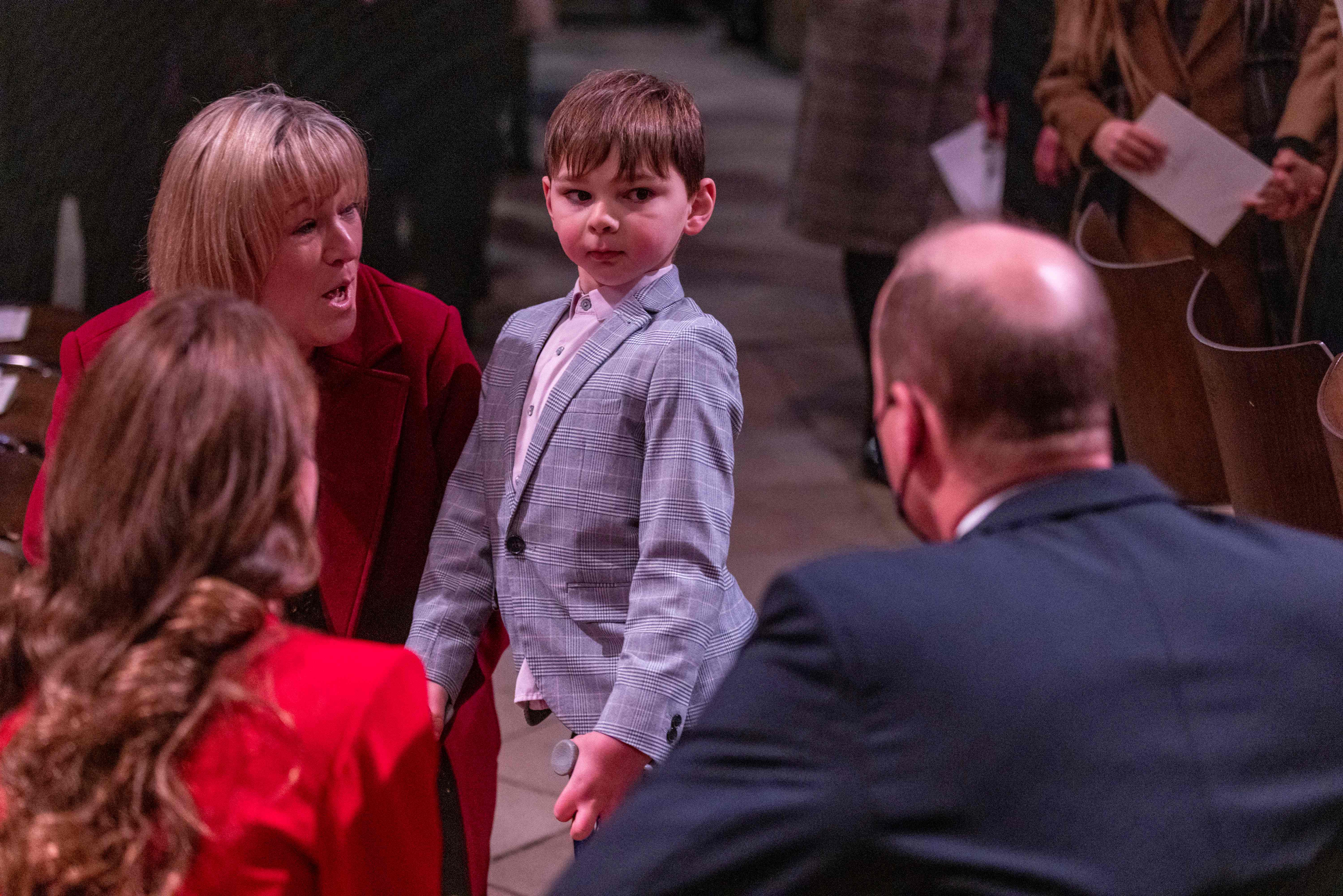 A smartly dressed Tony meets Prince William and Princess Catherine during the Together At Christmas community carol service at Westminster Abbey, London, on 8 December 2021. Tony, accompanied by his mother Paula in a red coat, had by then raised more than £1.5 million for Evelina London Children's Hospital.