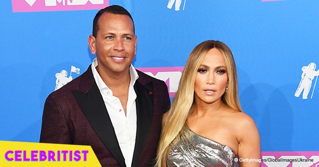 Jennifer Lopez hits the red carpet in sparkly silver gown with Alex Rodriguez at MTV VMAs