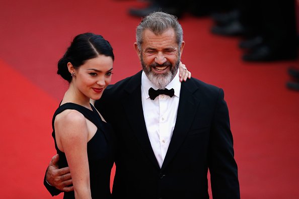 Mel Gibson (R) and Rosalind Ross attend the closing ceremony of the 69th annual Cannes Film Festival at the Palais des Festivals on May 22, 2016, in Cannes, France. | Source: Getty Images.