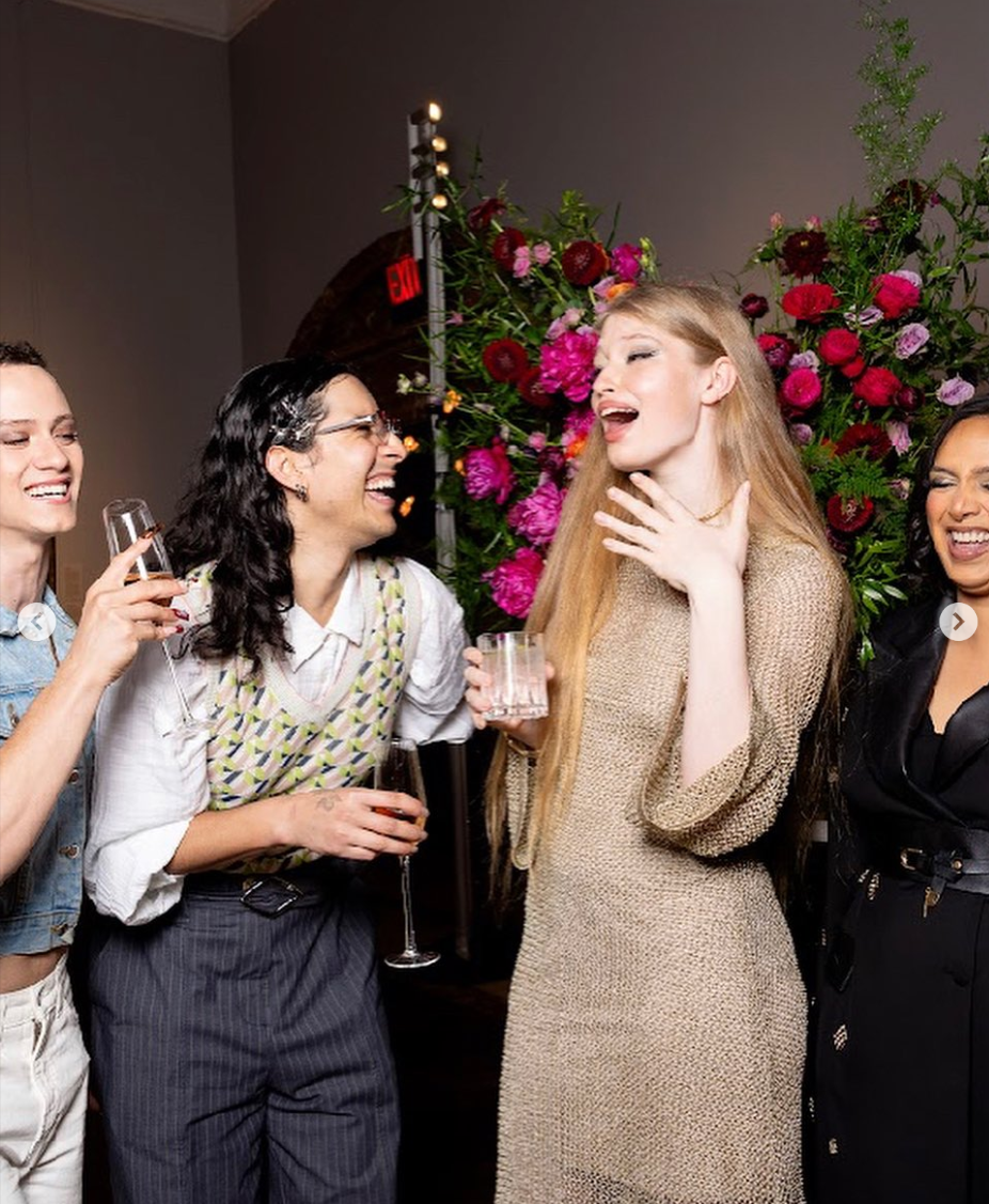 Vivian Wilson is all laughs as she interacts with other persons at a Teen Vogue event, dated May 13, 2025 | Source: Instagram/vivllainous