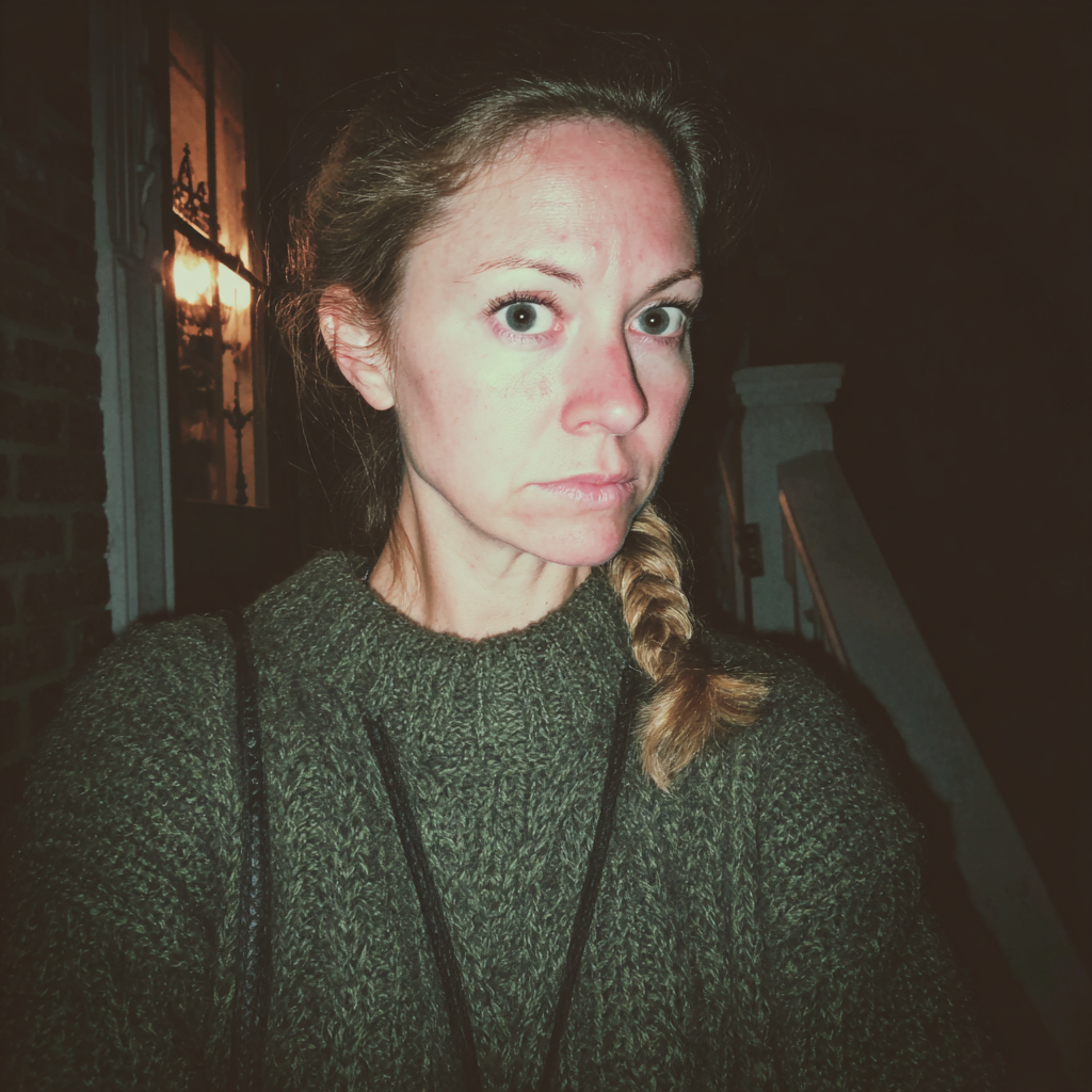 An upset woman standing outside in the dark | Source: Midjourney