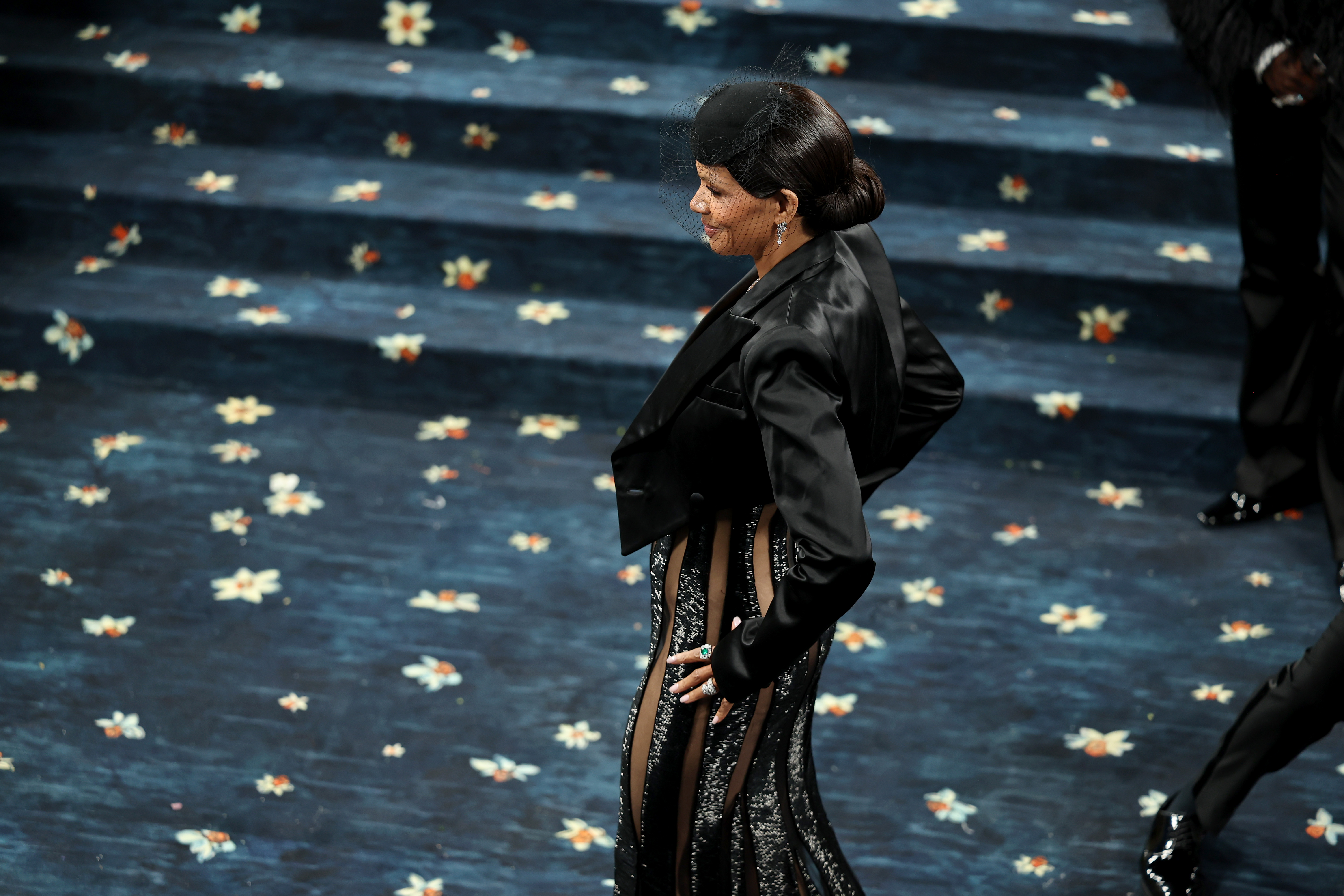 Halle Berry is captured posing for photographs near the Met steps on May 5, 2025, in New York City | Source: Getty Images