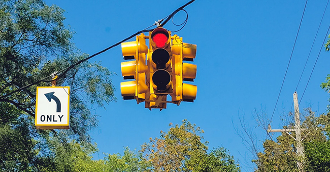 One Elderly Woman Tells Another That She Is Driving through a Red Light