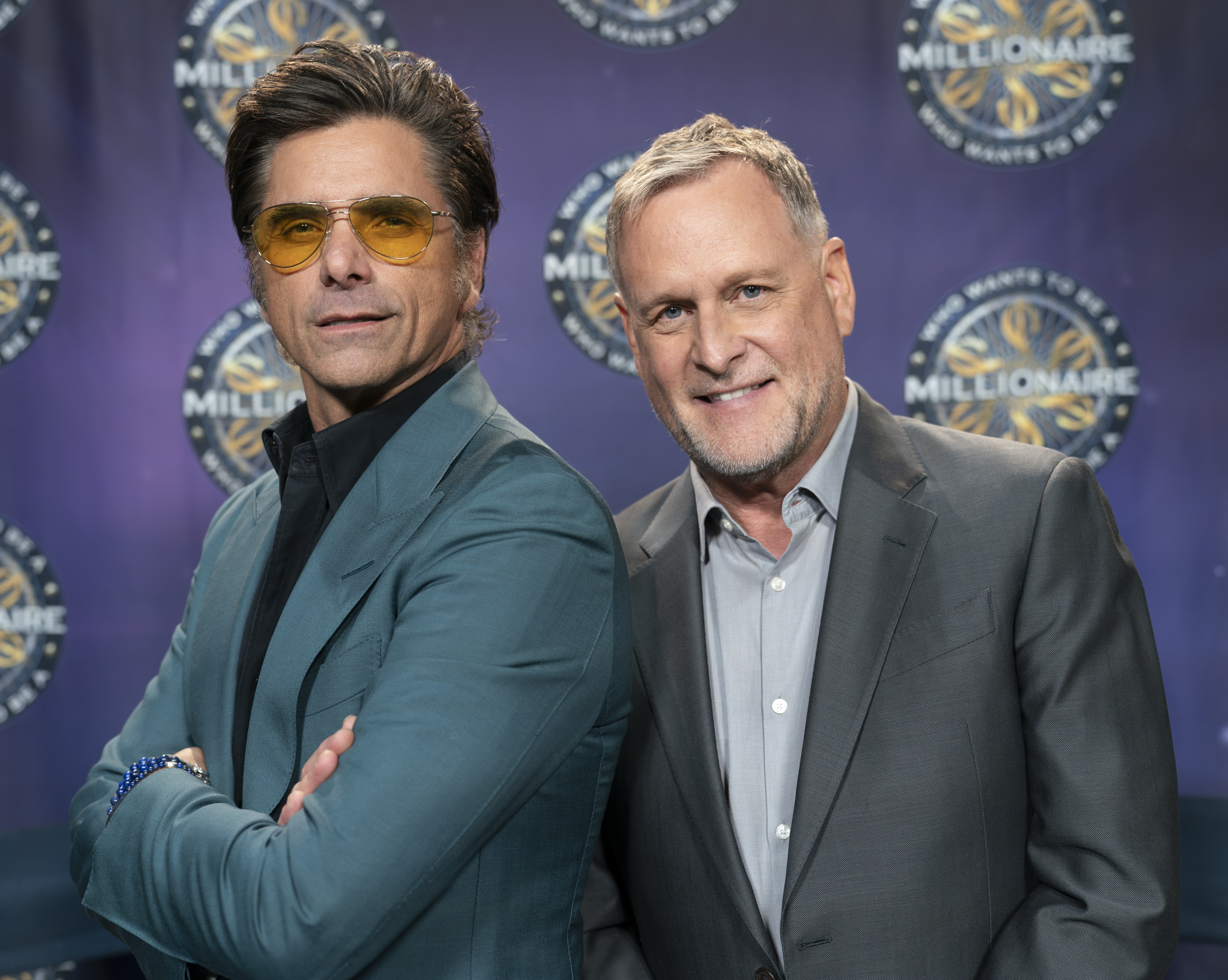 John Stamos and Dave Coulier on an episode of "Who Wants to Be a Millionaire" in 2024. | Source: Getty Images