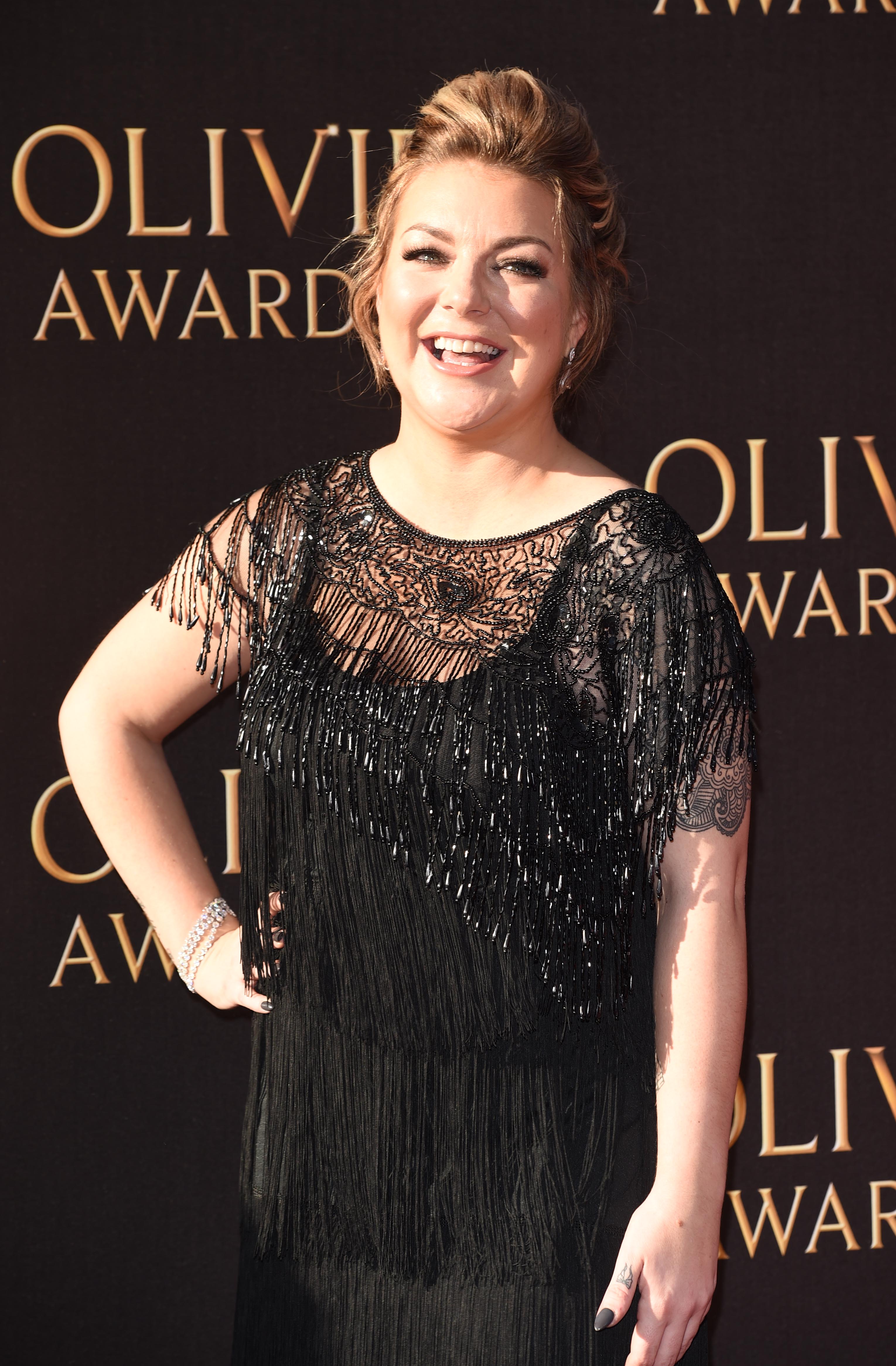 A fuller-figured Smith beams in a heavily beaded and fringed black gown on the red carpet at the Olivier Awards at the Royal Albert Hall, London, on 9 April 2017 — the same evening she spoke publicly about her weight gain for "The Moorside".
