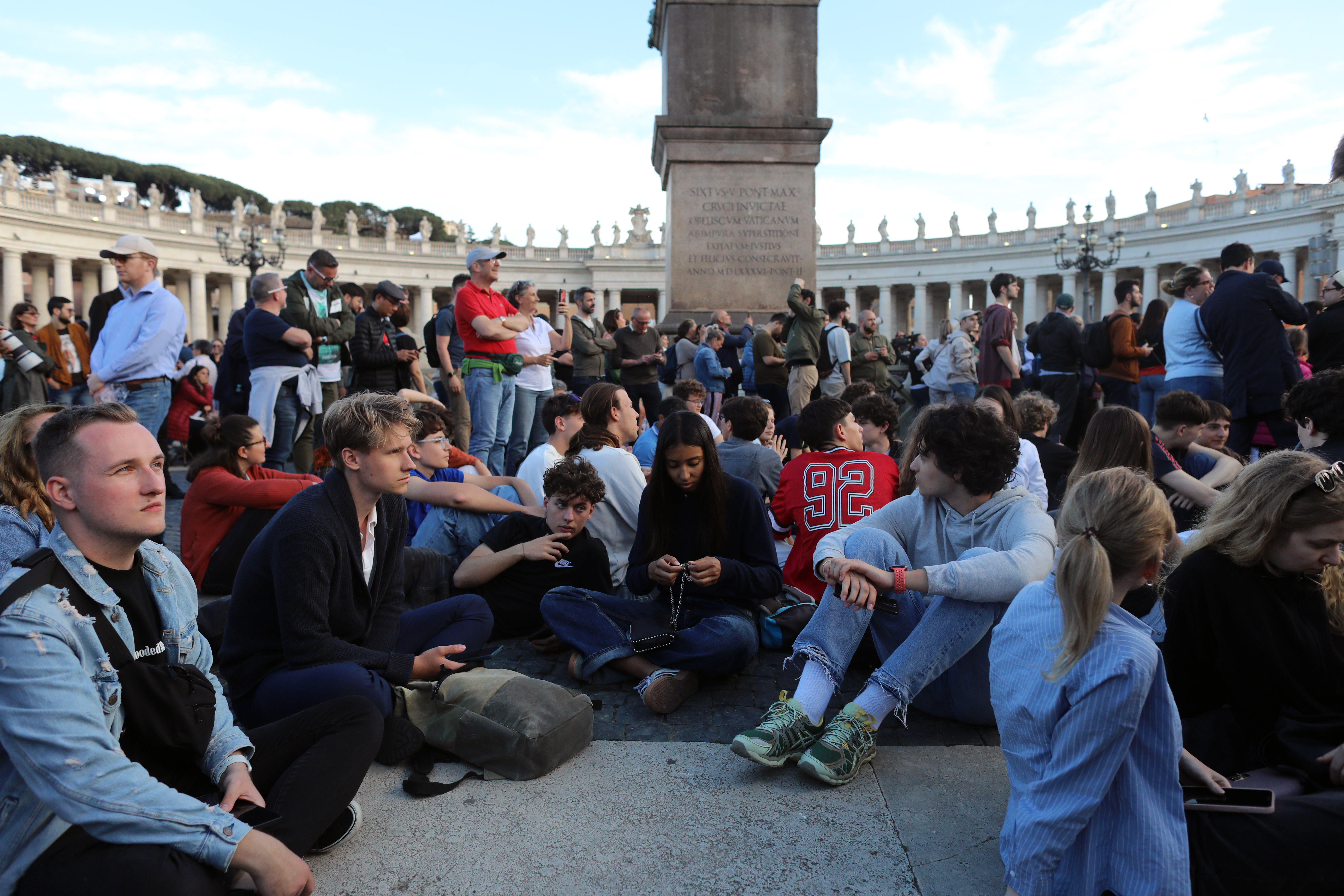 People gather in St. Peter's Square on May 7, 2025, in Vatican City for the first day of the conclave | Source: Getty Images