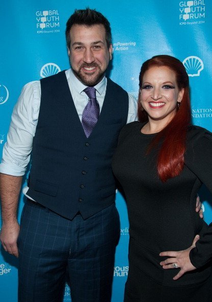 Joey Fatone and Kelly Baldwin at The Conga Room at L.A. Live on February 8, 2013 in Los Angeles, California. | Photo: Getty Images
