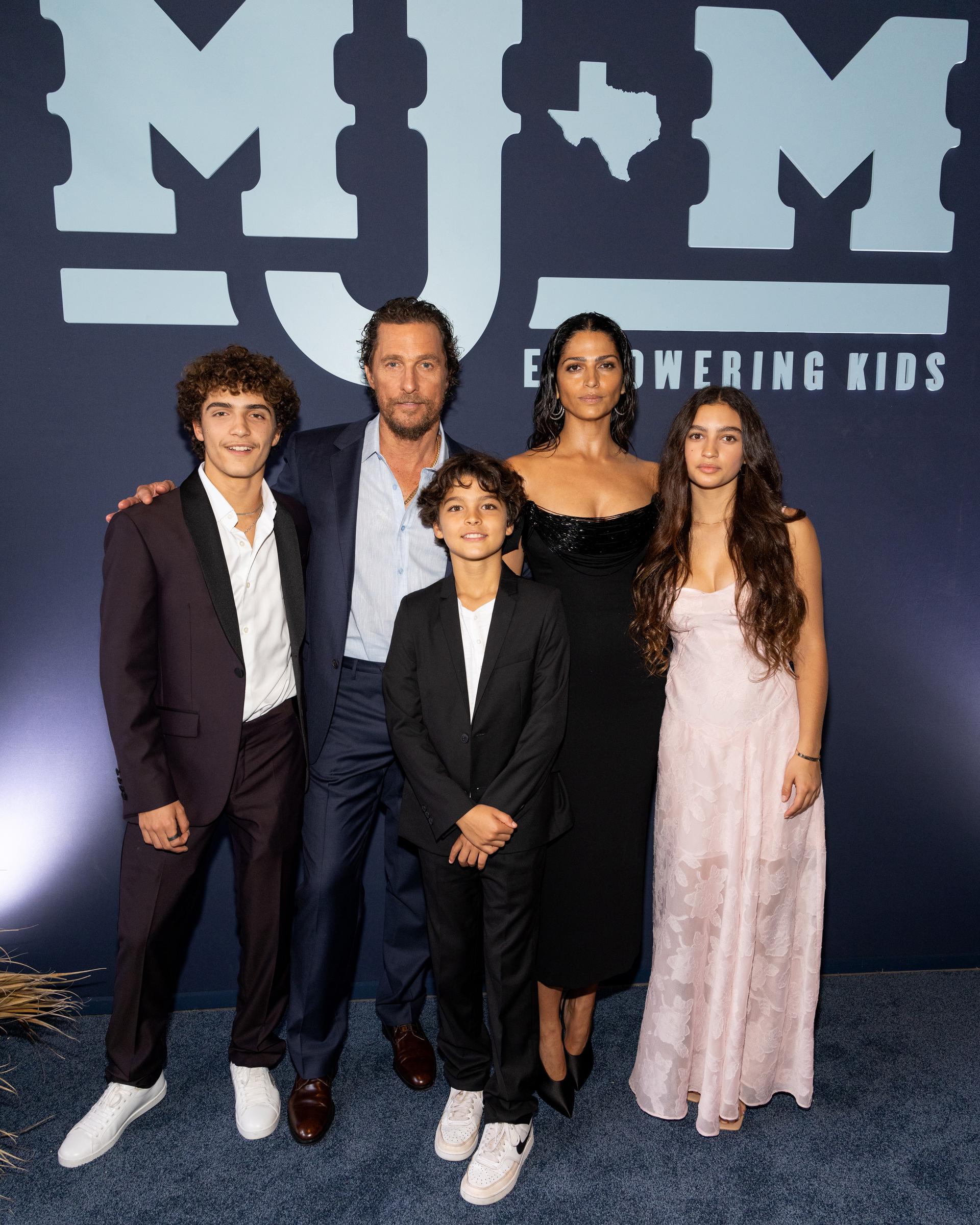 Levi, Matthew, and Livingston McConaughey, Camila Alves McConaughey, and Vida McConaughey at the 12th Annual Mack, Jack & McConaughey Gala on April 25, 2024, in Austin, Texas | Source: Getty Images