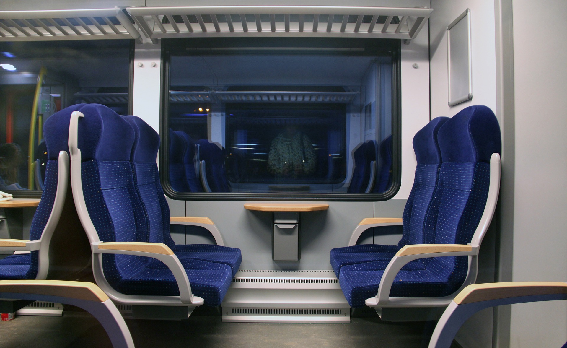Blue-colored seats in a train | Source: Pixabay