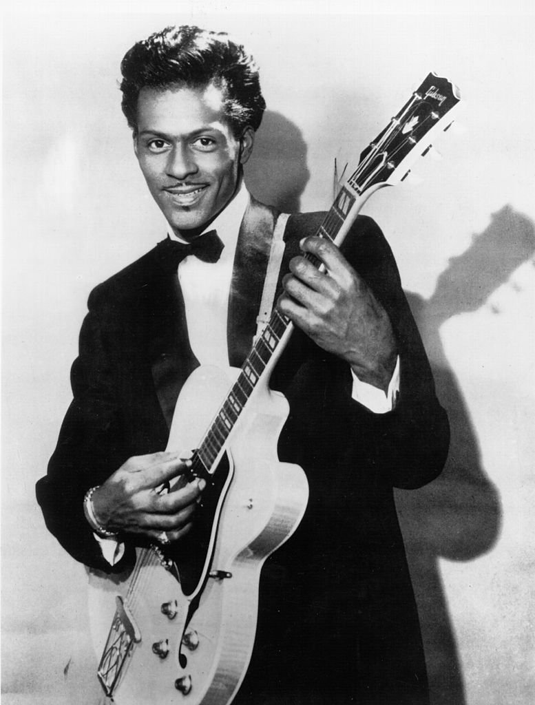 Rock and roll musician Chuck Berry poses for a portrait holding his Gibson hollowbody electric guitar in circa 1958 | Photo: Getty Images