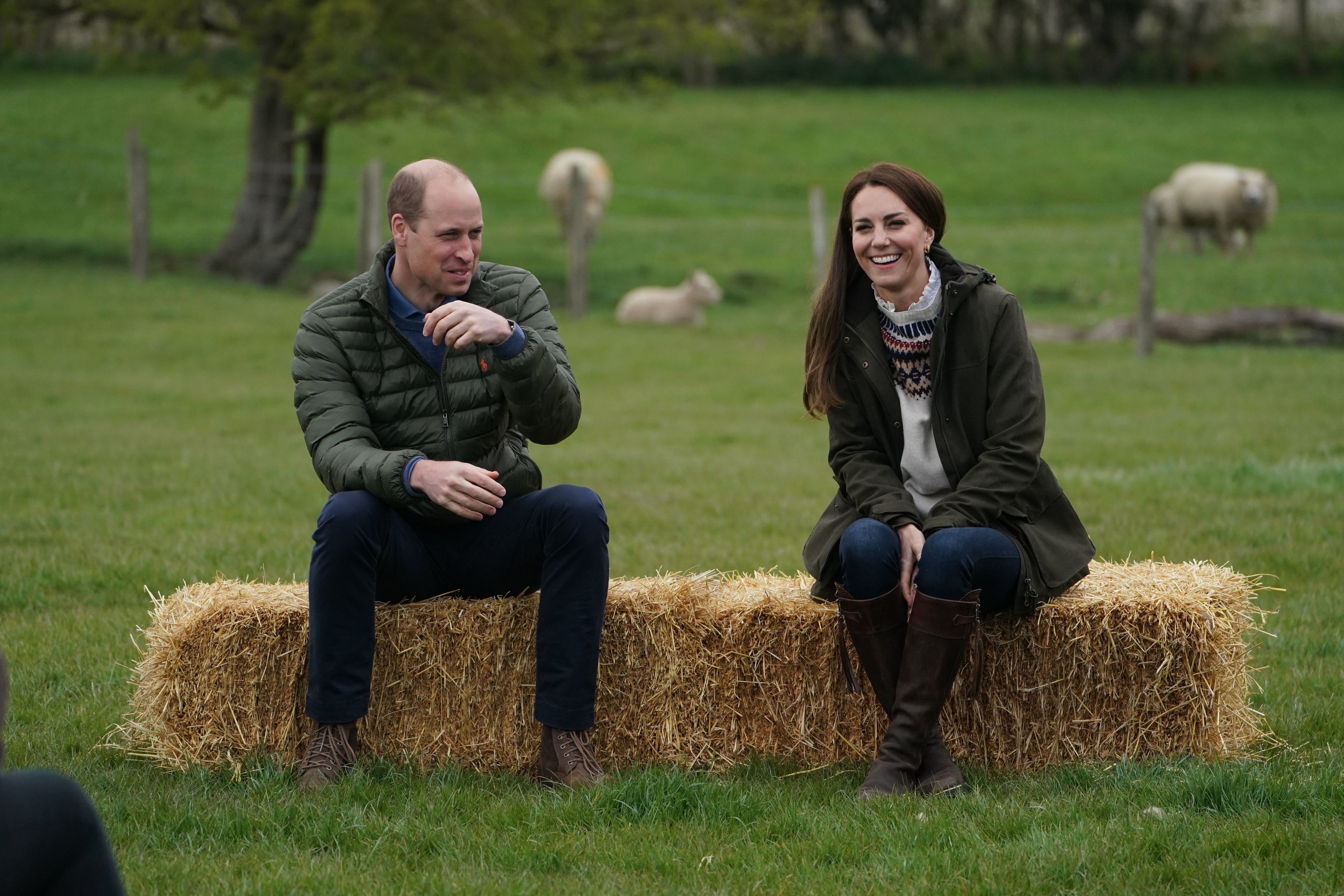 Prince William and his wife Kate Middleton at a royal visit to Manor Farm in Little Stainton, Durham on April 27, 2021 in Darlington, England. | Source: Getty Images
