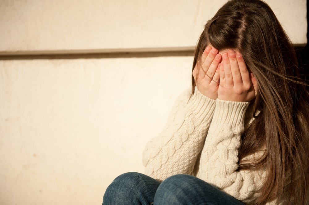 Grief-striken woman. | Photo: Shutterstock