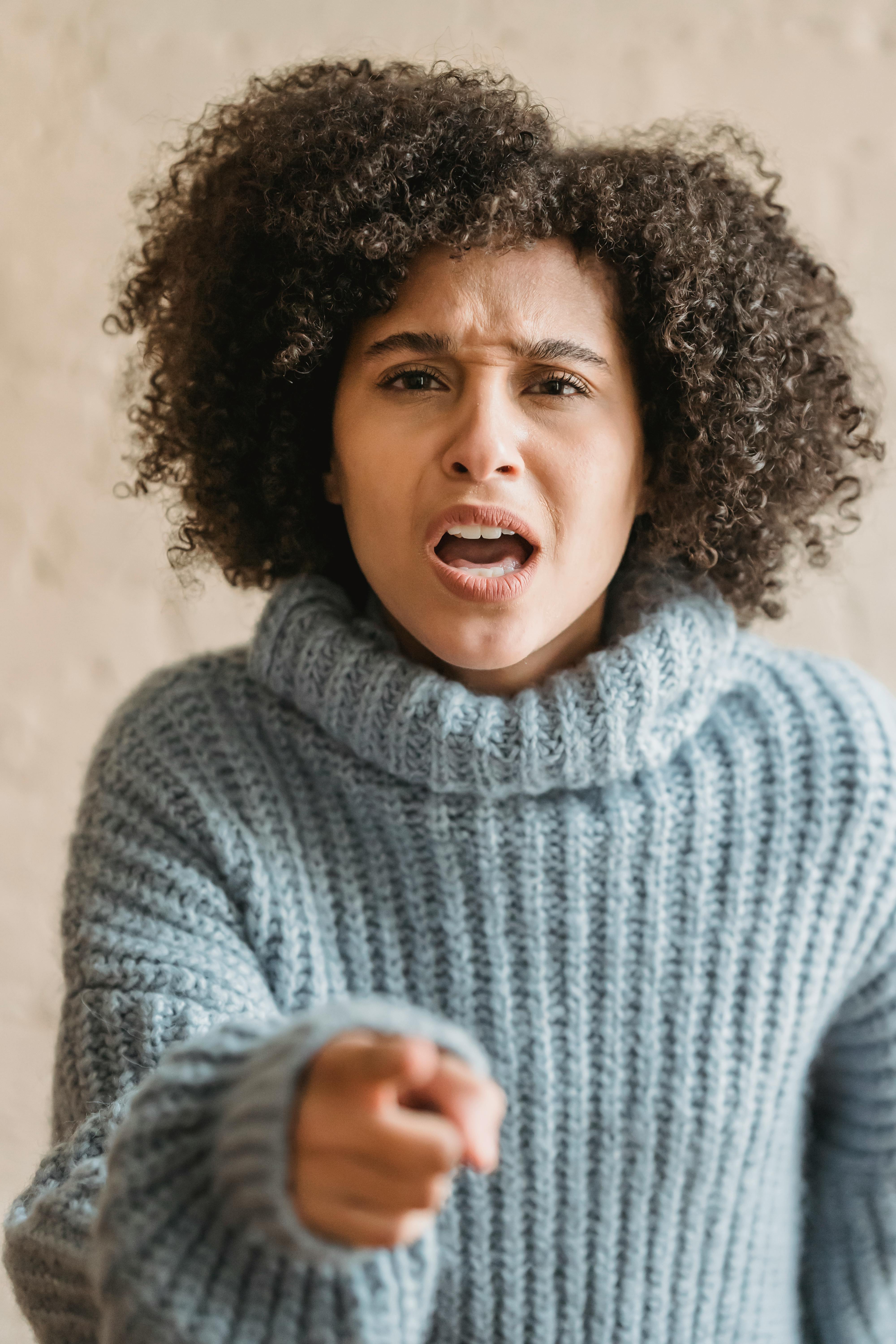 Woman tries to respond to allegations. For illustration purposes only | Source: Pexels