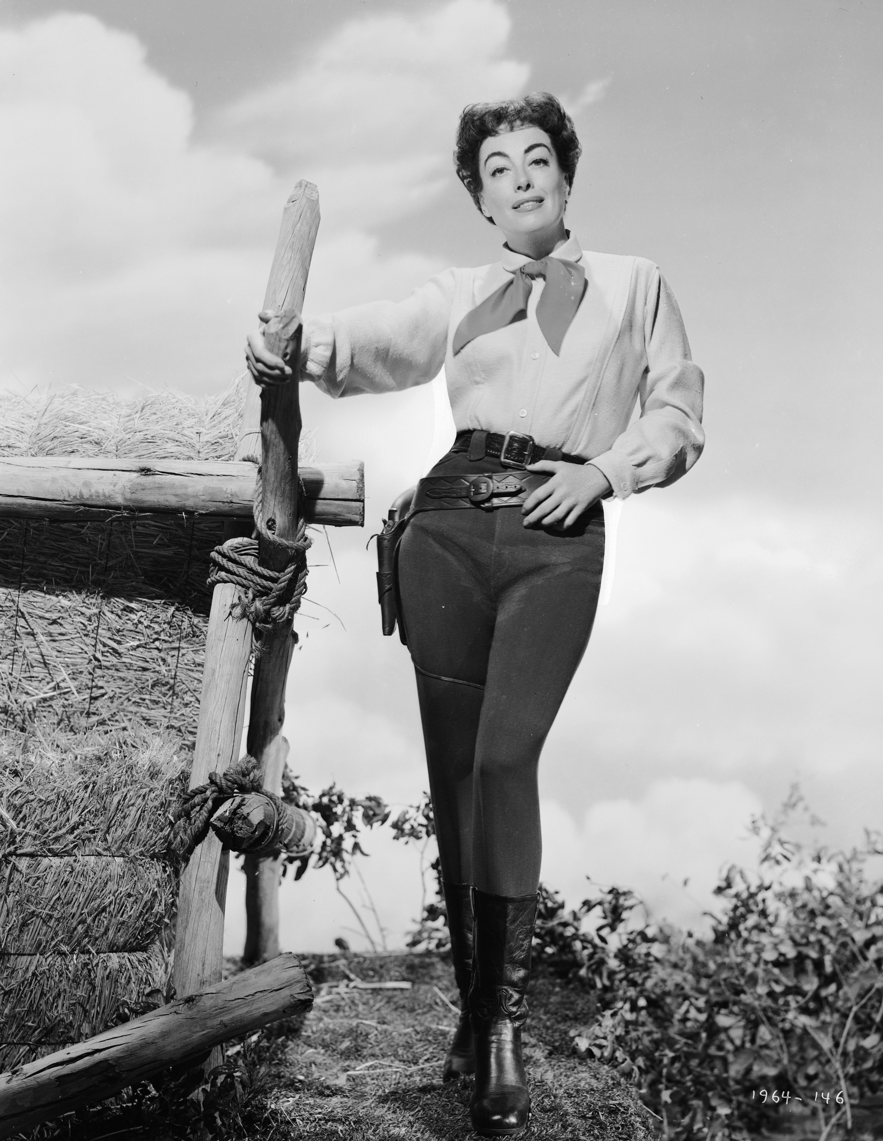 American film actress Joan Crawford (1908 - 1977) in costume for her role in the western 'Johnny Guitar',1954 | Source:Getty Images