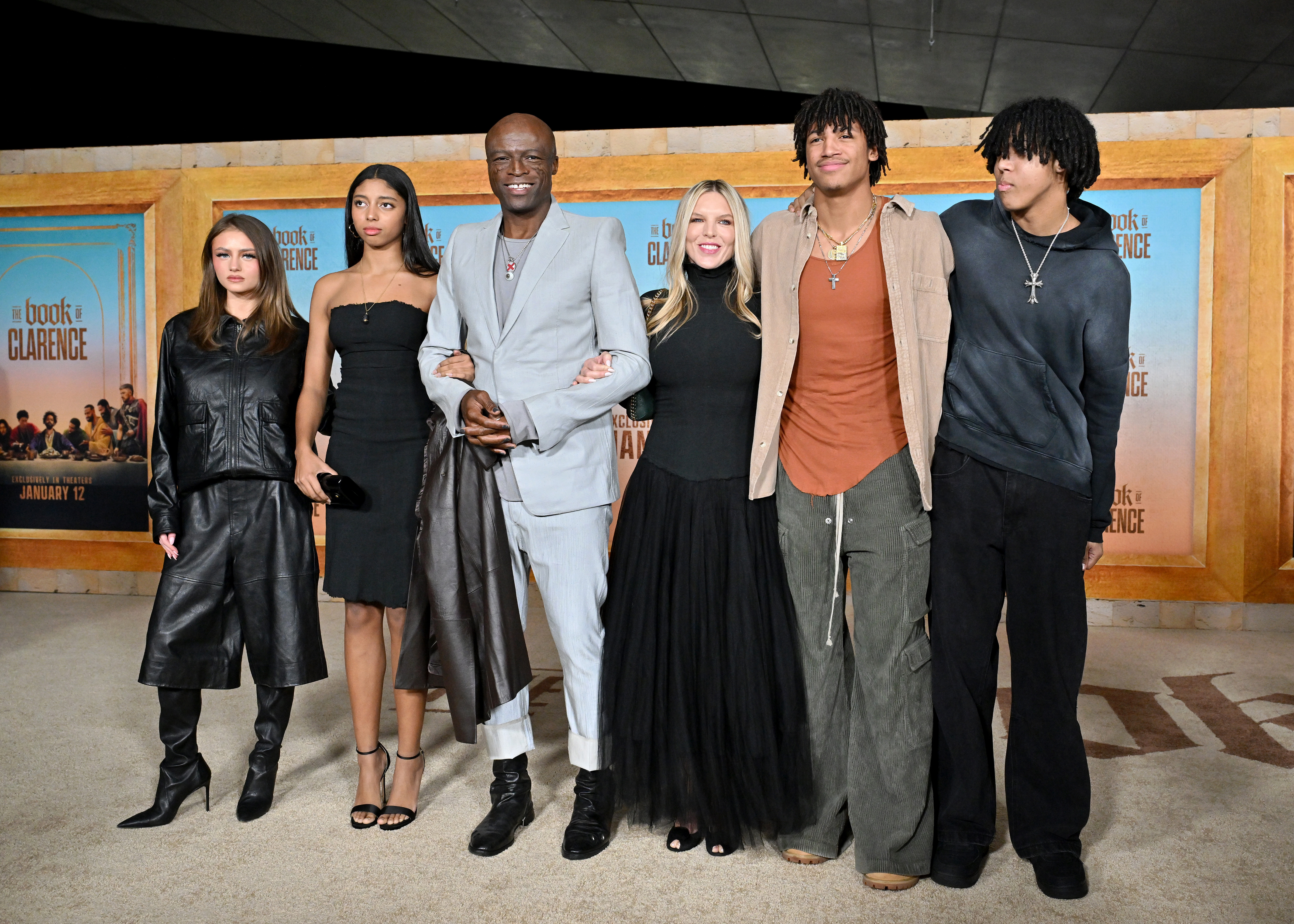 Posing in polished harmony at the Los Angeles premiere of "The Book of Clarence," Seal stands proudly alongside Leni, Lou, Henry, and Johan Smauel — joined by Laura Strayer.