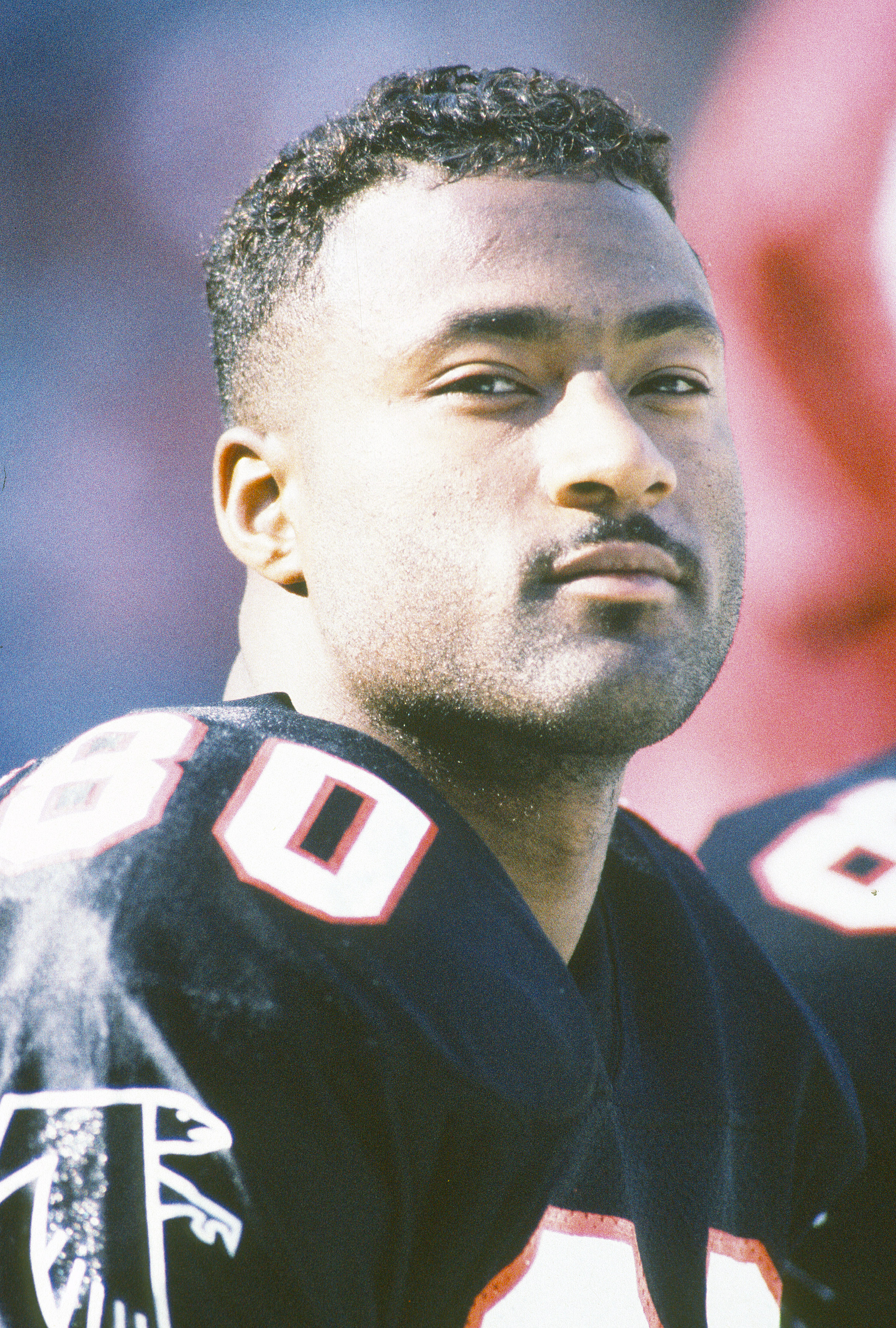 Andre Rison looks on from the bench against the Minnesota Vikings during an NFL Football game on September 8, 1991  | Source: Getty Images