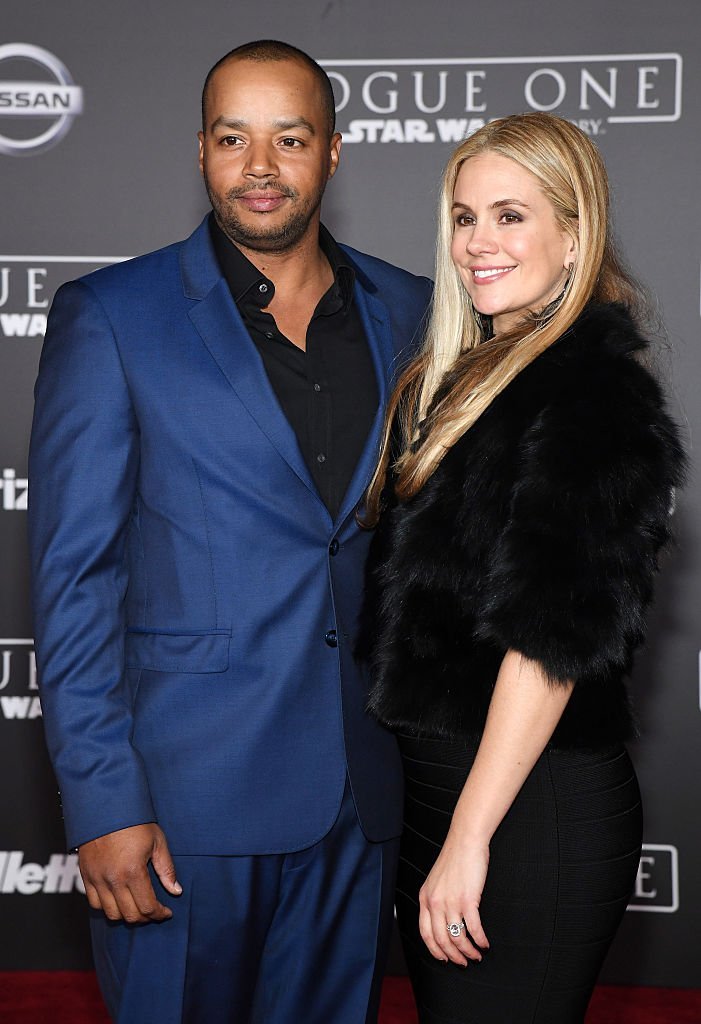 Actor Donald Faison (L) and his wife CaCee Cobb attend the premiere of Walt Disney Pictures and Lucasfilm's "Rogue One: A Star Wars Story" at the Pantages Theatre | Photo: Getty Images