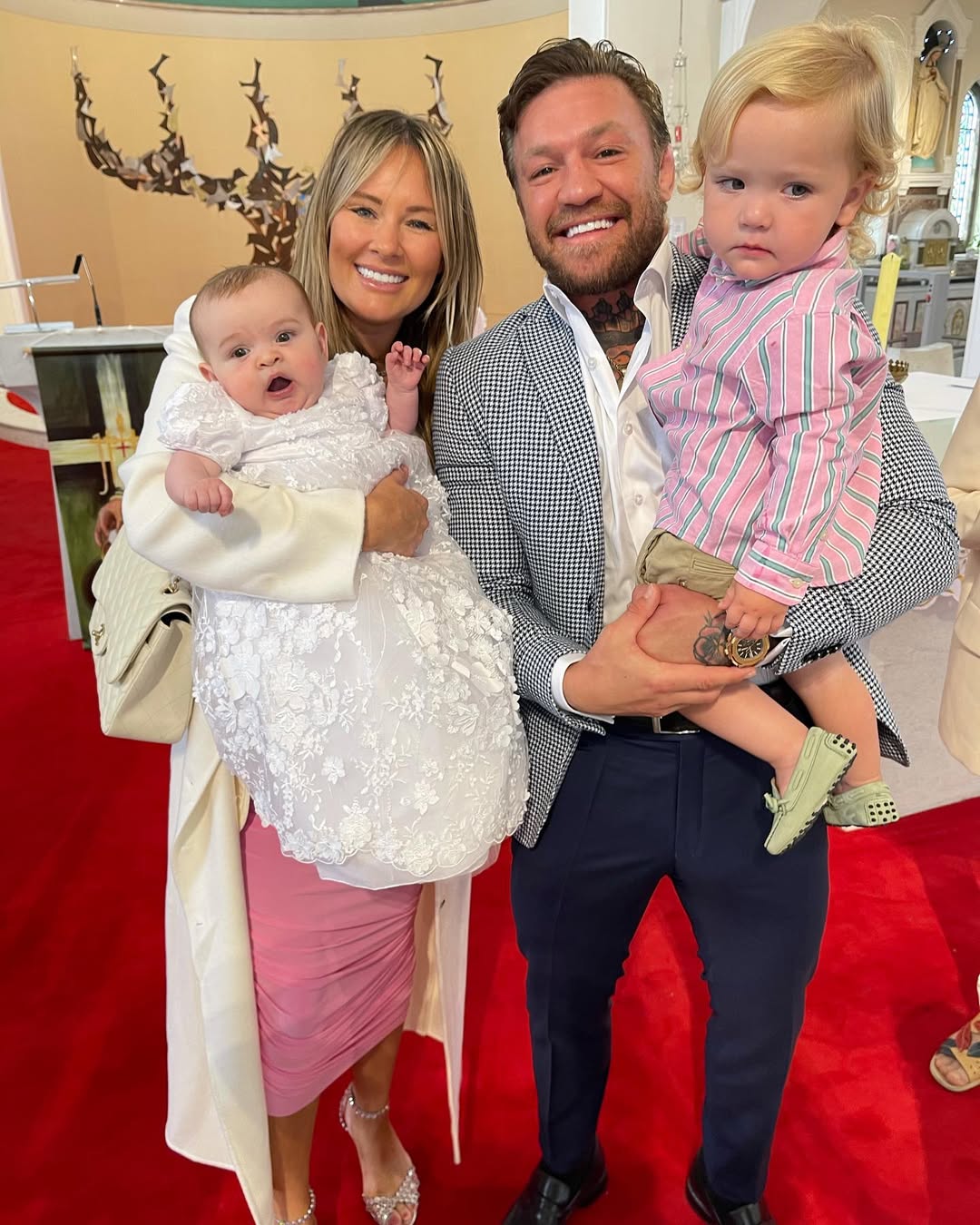 Conor McGregor and Dee Devlin with their children from a post dated August 6, 2023. | Source: Instagram/thenotoriousmma
