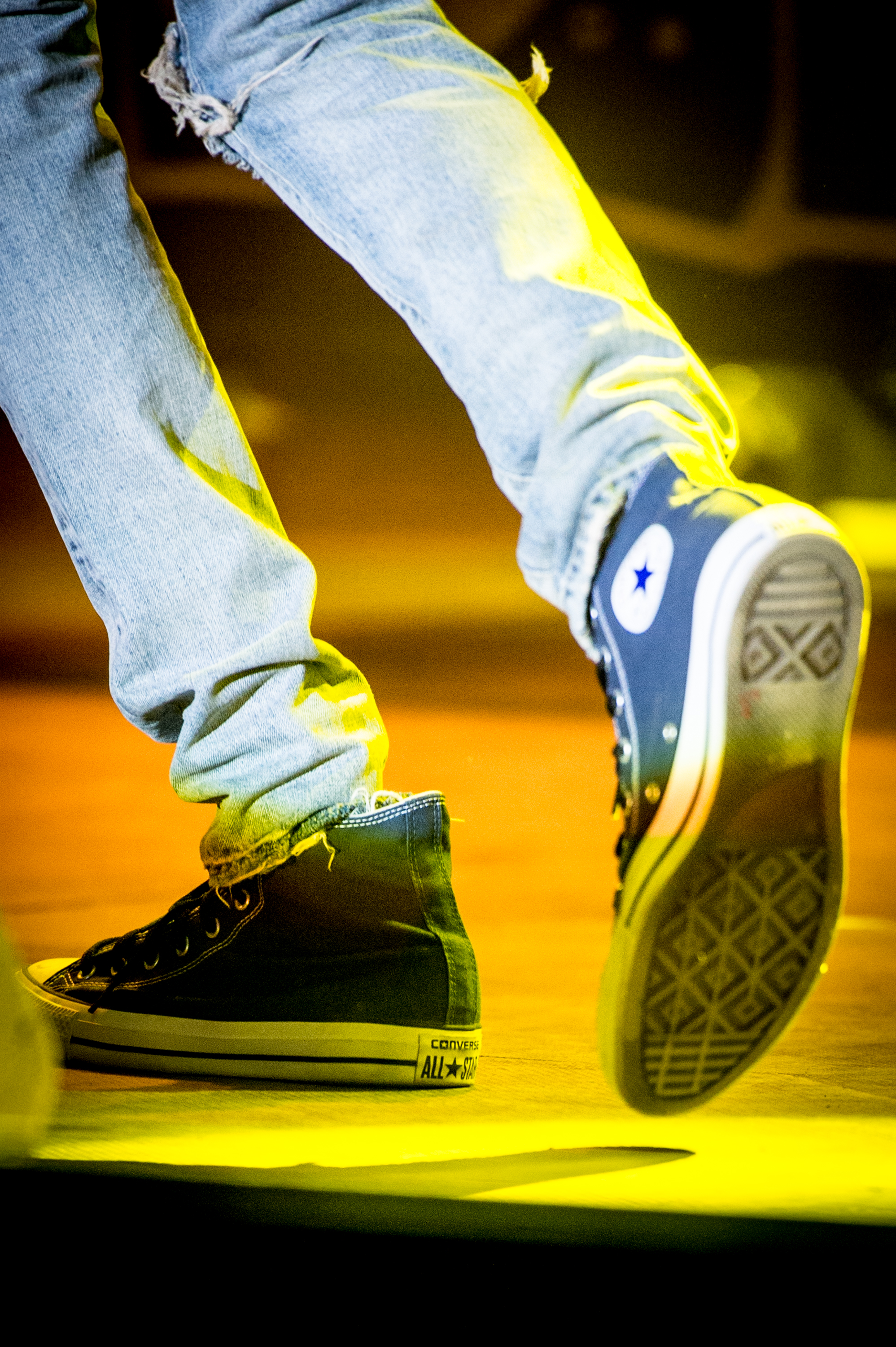 A close-up of Wiz Khalifa wearing Converse sneakers while onstage during Day 4 of Bestival 2016 at Robin Hill Country Park on September 11 in Newport, Isle of Wight. | Source: Getty Images