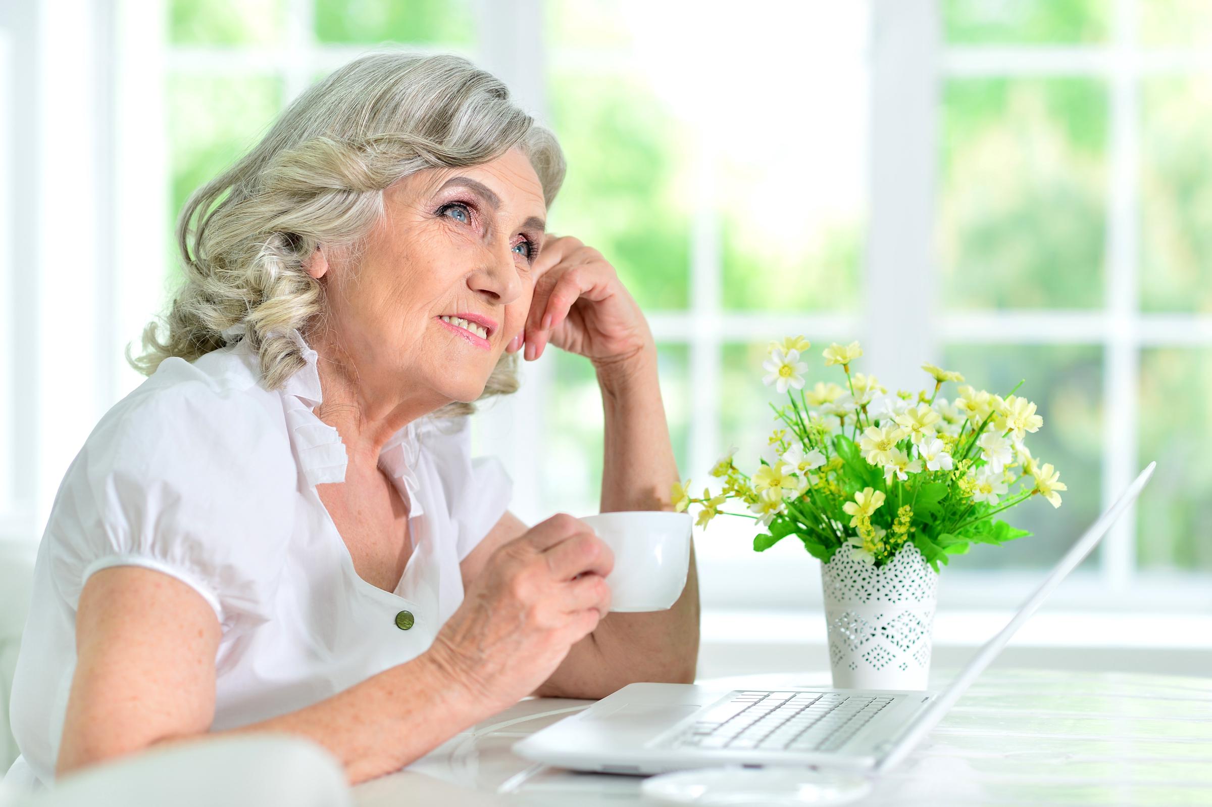 Woman enjoying a cup of coffee | Source: Shutterstock