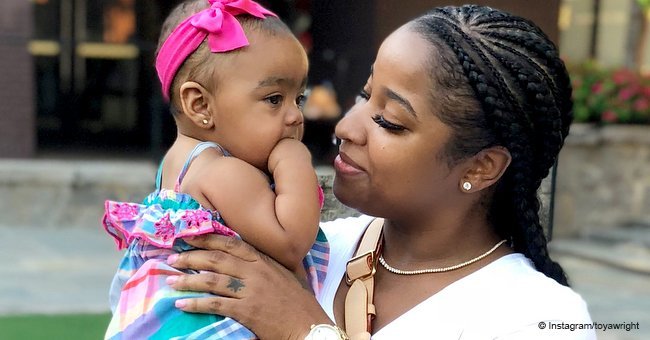 Toya Wright's daughter baby Reign snatches hearts in pic while napping in Gucci onesie